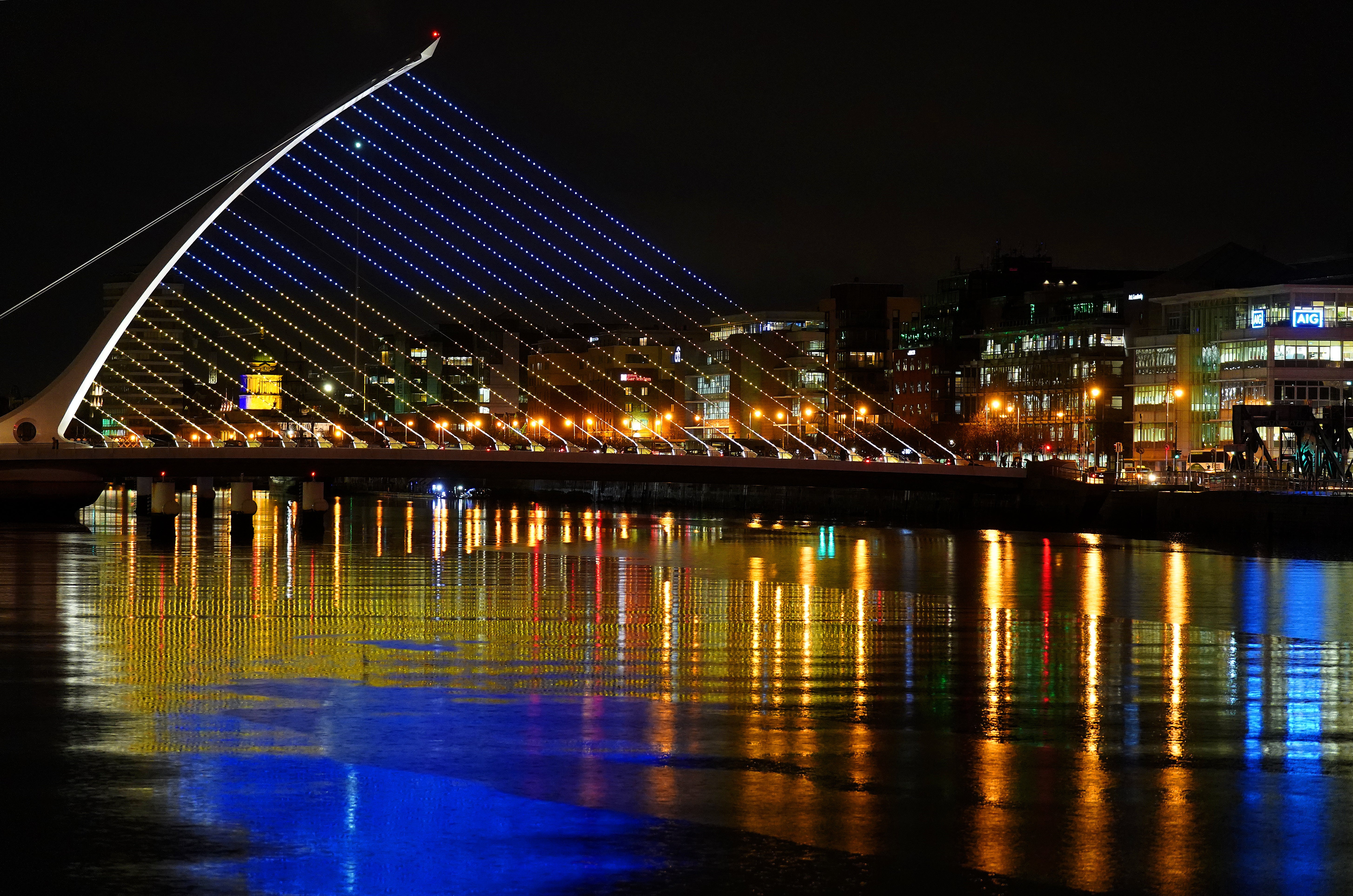 The Samuel Beckett Bridge in Dublin’s city centre displays the colours of the Ukrainian flag as a show of support. Blood bags and medical masks have been sent to Ukraine by Ireland (Brian Lawless/PA)