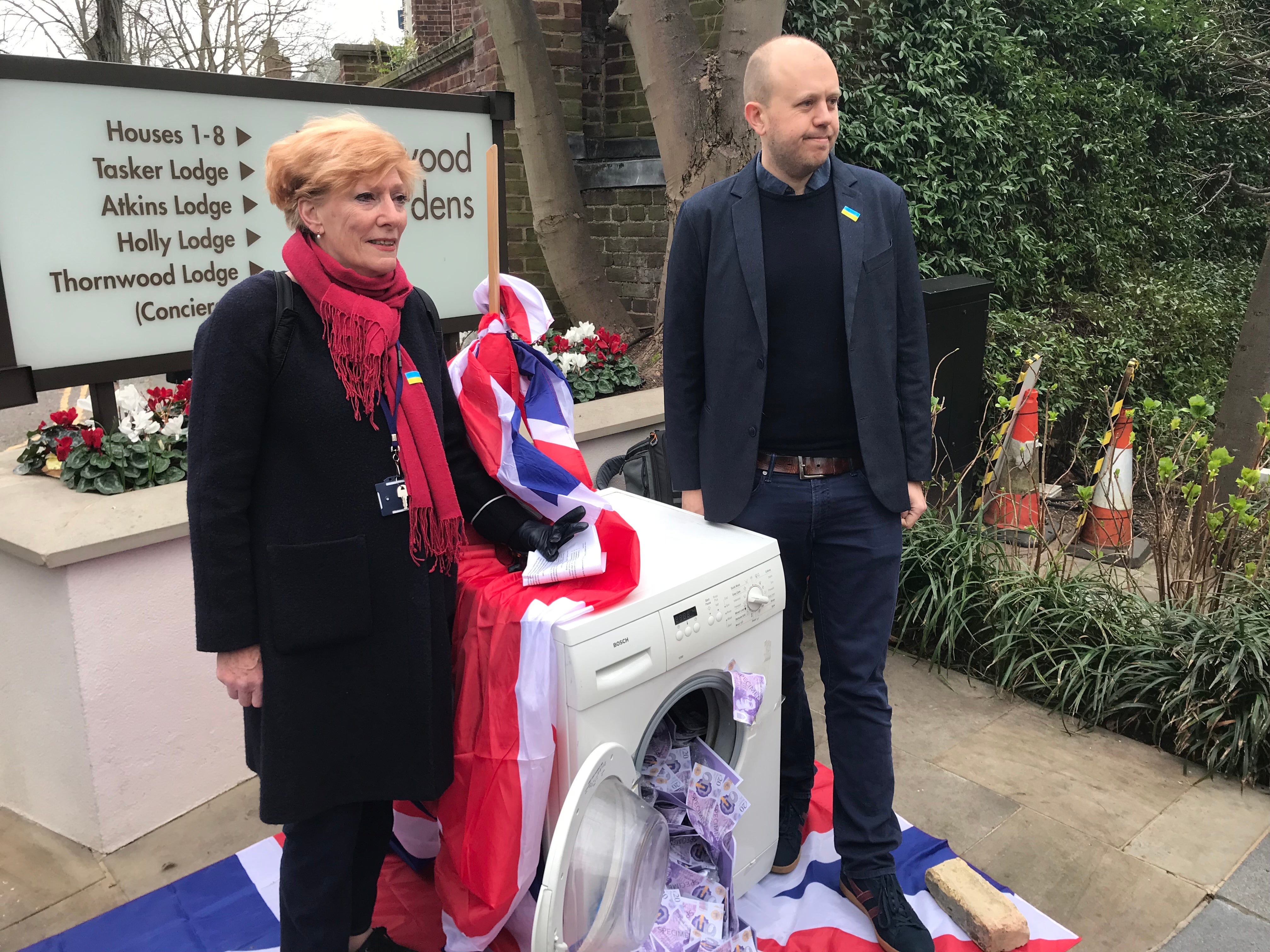 Monica Press and Joe Powell at the protest in Thornwood Gardens, London, on Friday