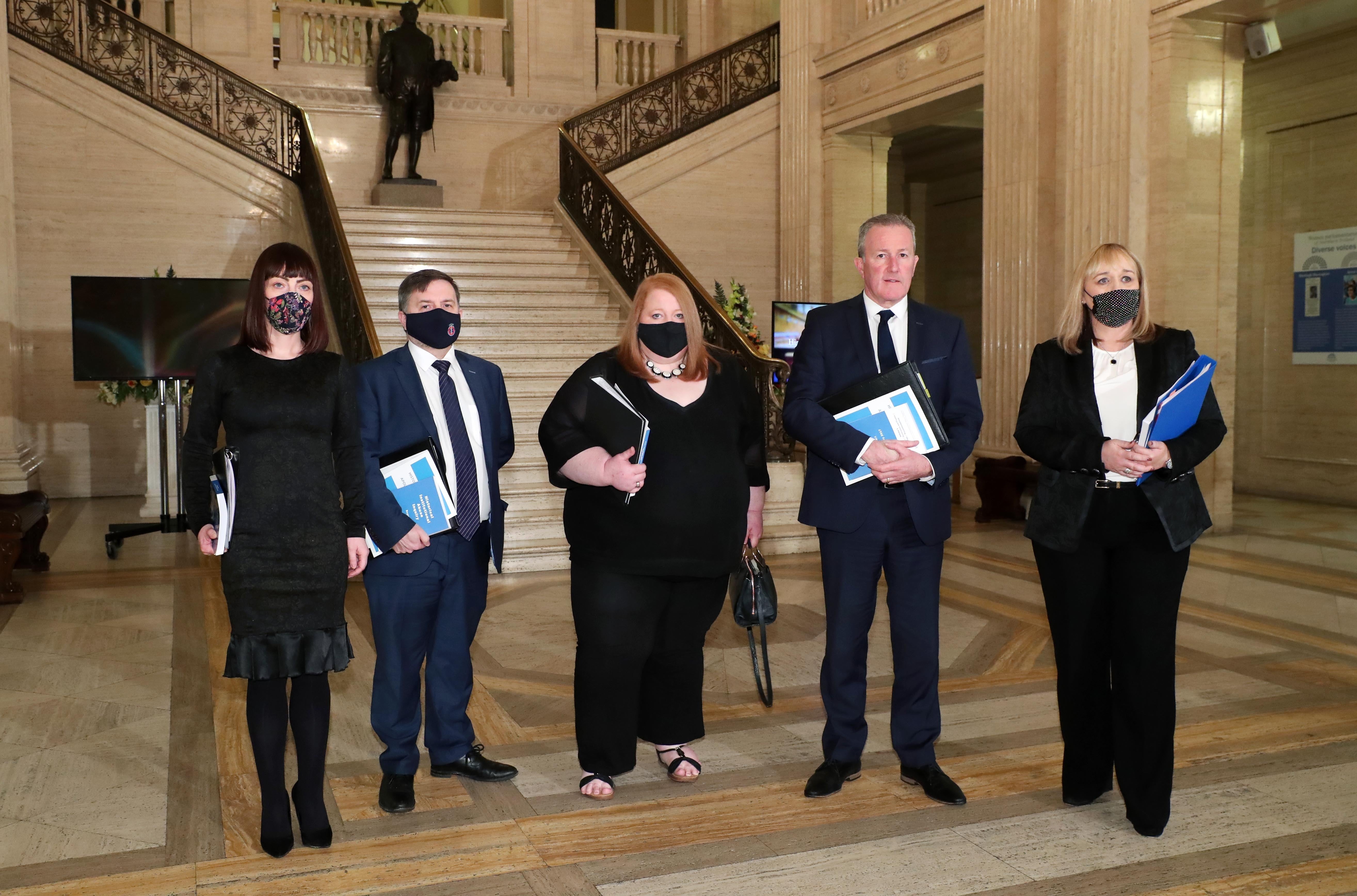 Ministers Nichola Mallon, Robin Swann, Naomi Long, Conor Murphy and Michelle McIlveen as they head to the Northern Ireland Assembly chamber at Stormont before the delivery of the long-awaited public apology to the victims of historical institutional abuse. The public apology was recommended in the final report of the Historical Institutional Abuse Inquiry (HIAI), published more than five years ago (Brian Lawless/PA)