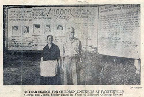 Mr and Mrs Sodder, posing in front of the billboard erected in an attempt to discover what happened to their missing children, never gave up hope the boys and girls were still alive, their granddaughter tells The Independent