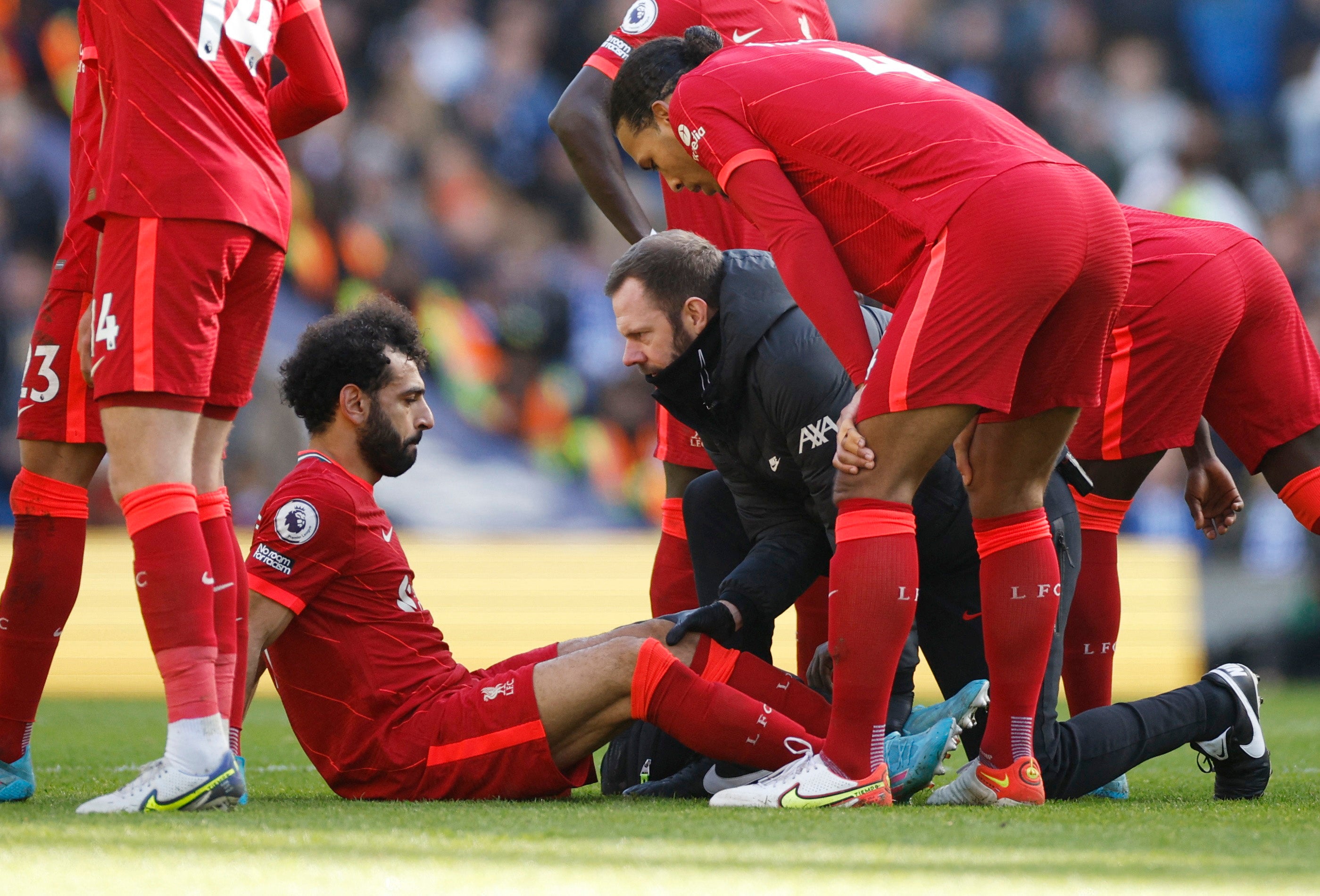 Mohamed Salah receives medical attention