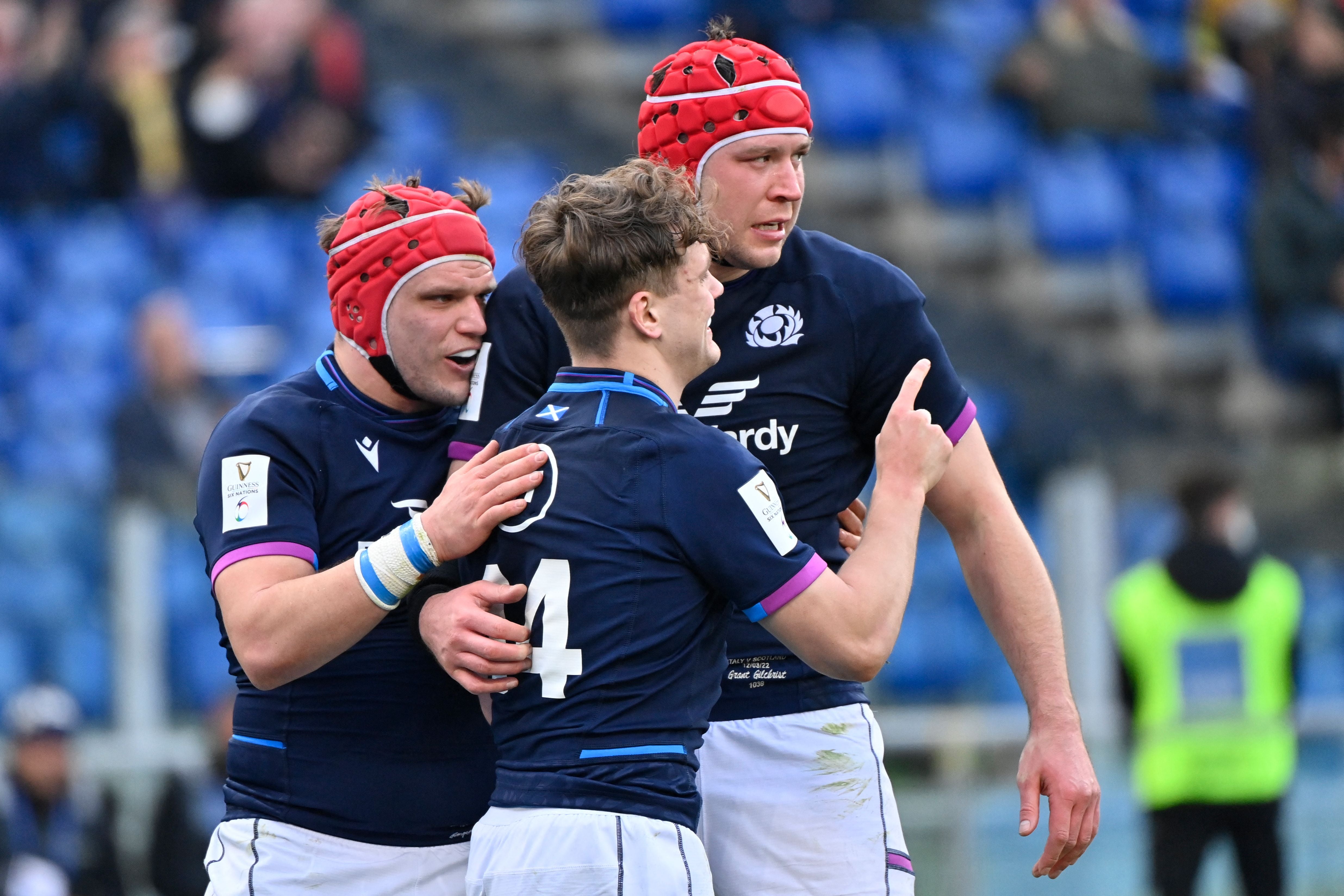 Darcy Graham celebrates after touching down for Scotland