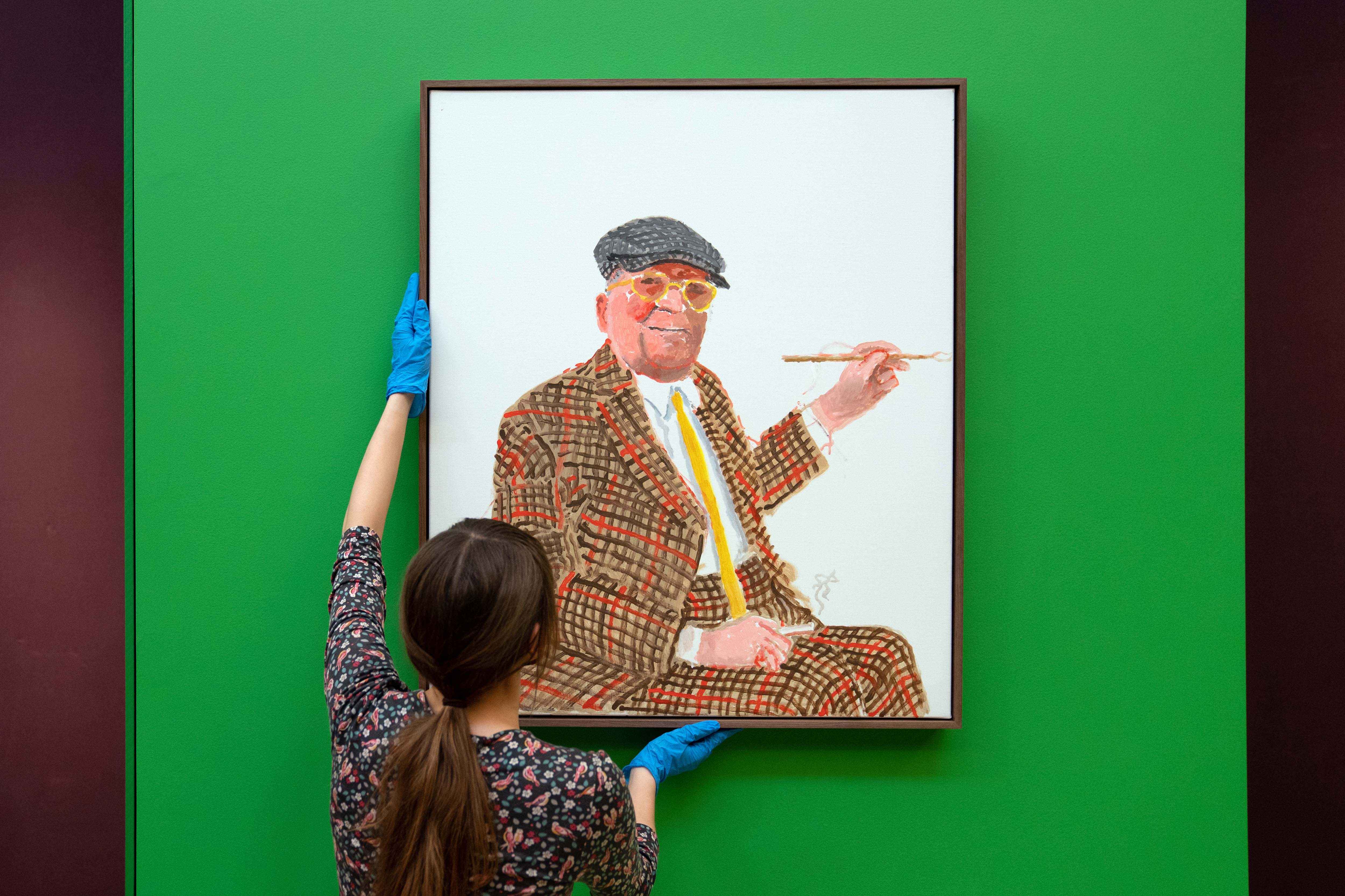 David Hockney’s Self Portrait, 22nd November 2021 is installed at Cambridge’s Fitzwilliam Museum (David Hockney/Joe Giddens/PA)