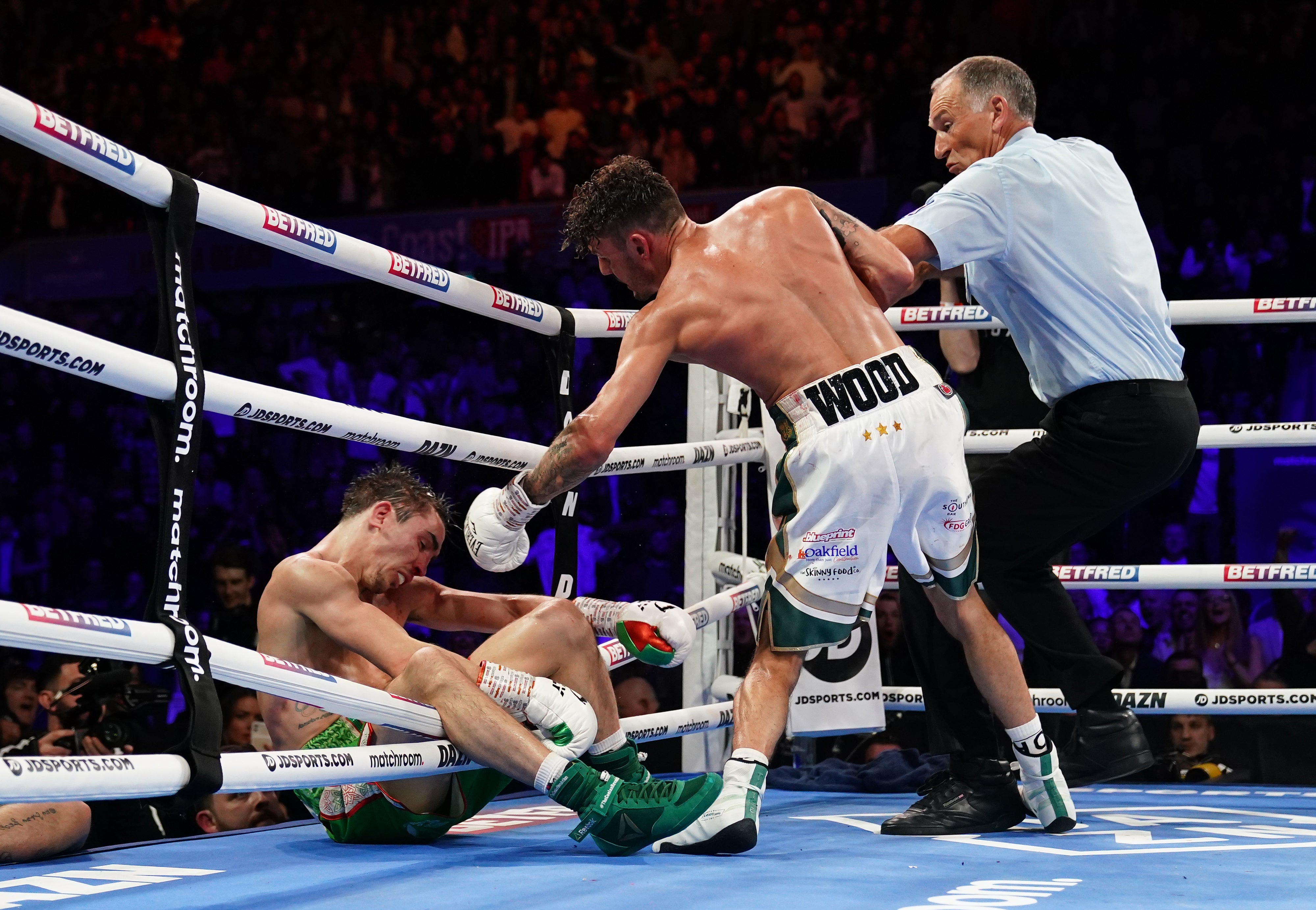 Michael Conlan was hurt following his tumble from the ring (Zac Goodwin/PA)