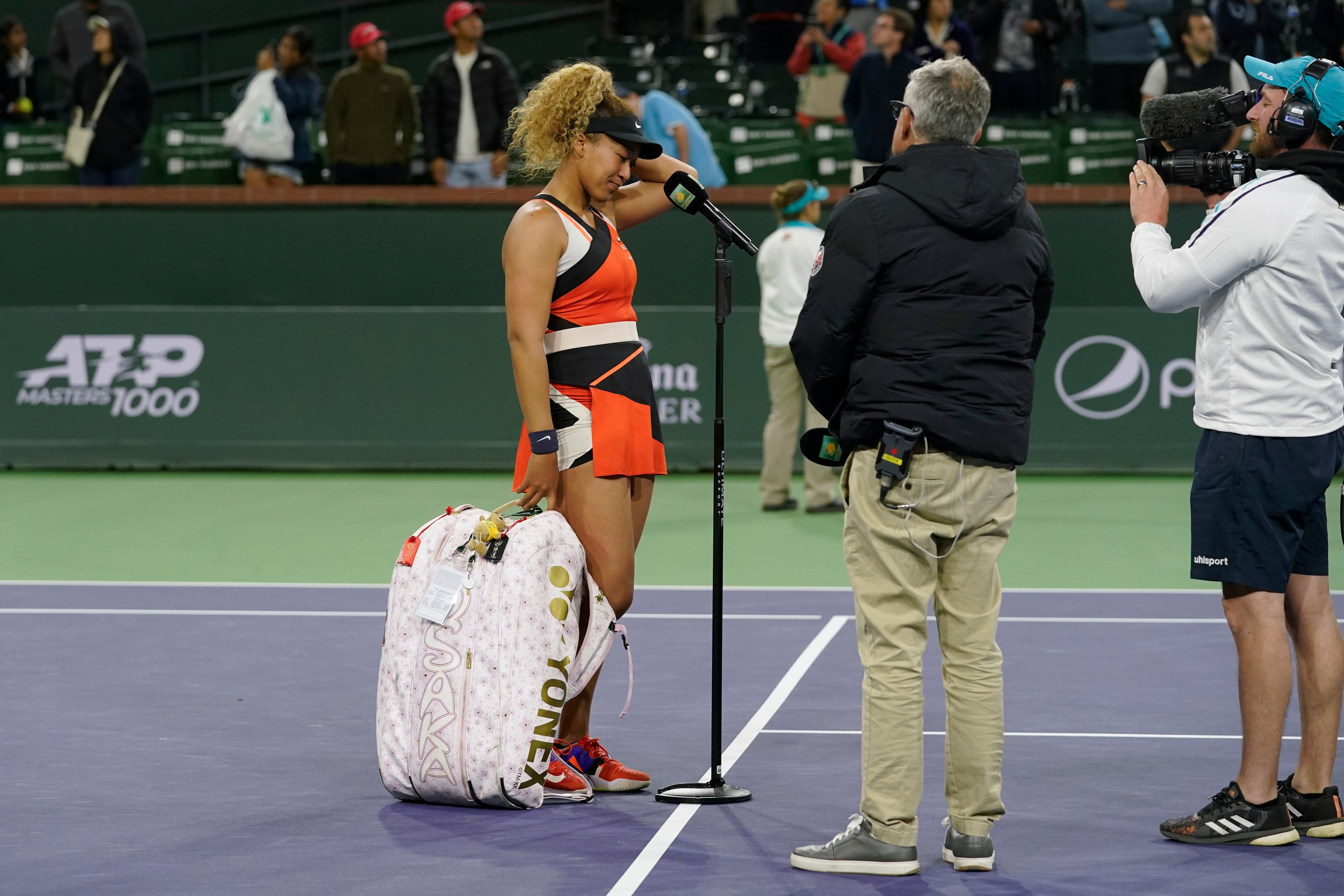 Osaka spoke through tears at the end of the game (Mark J. Terrill/AP)