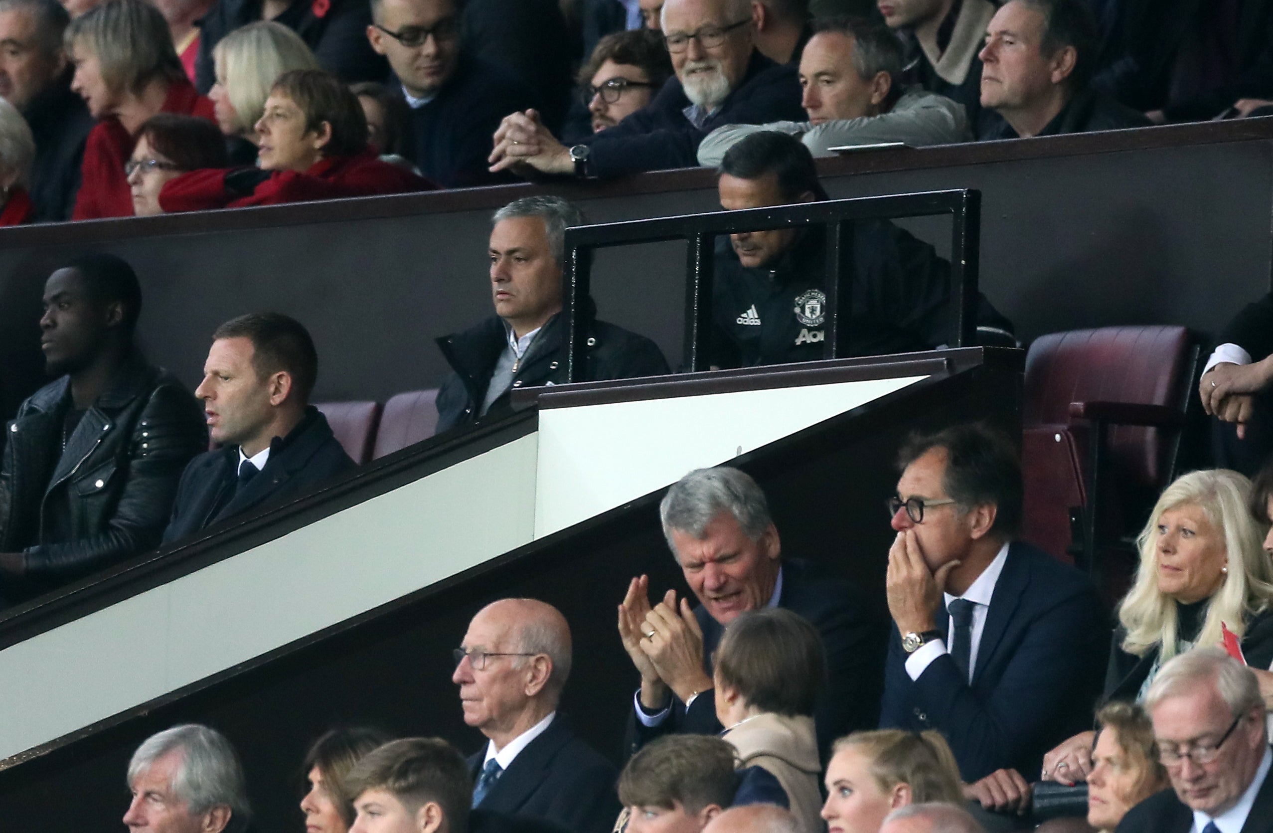 Jose Mourinho, centre, watches from the crowd against Burnley (Martin Rickett/PA)