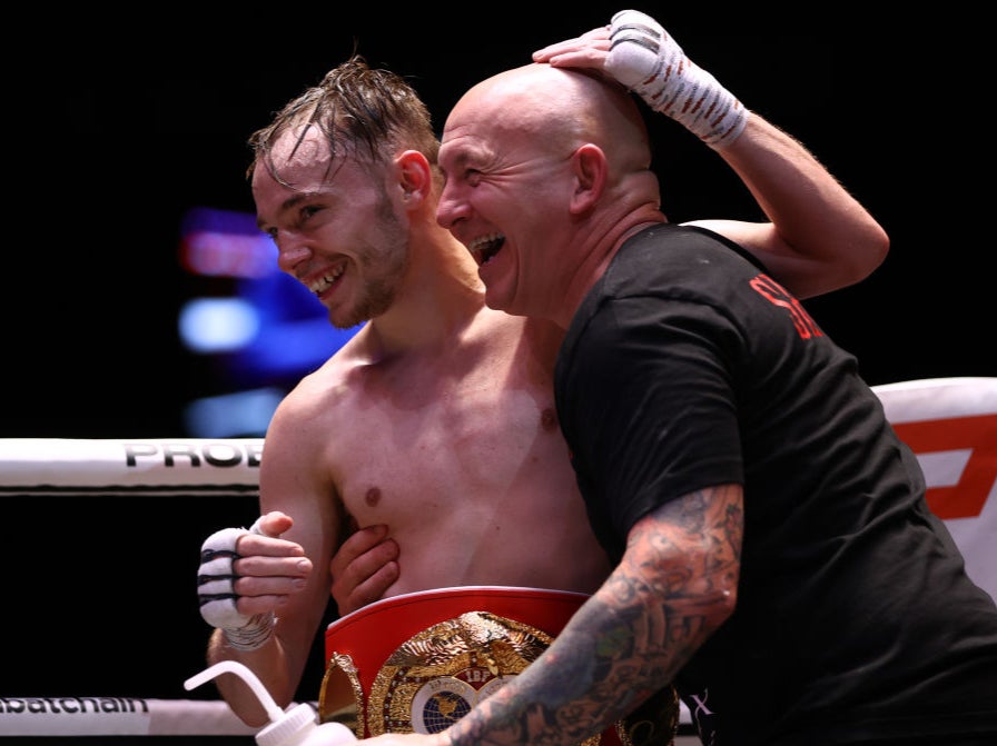 Sunny Edwards celebrates with his trainer Grant Smith