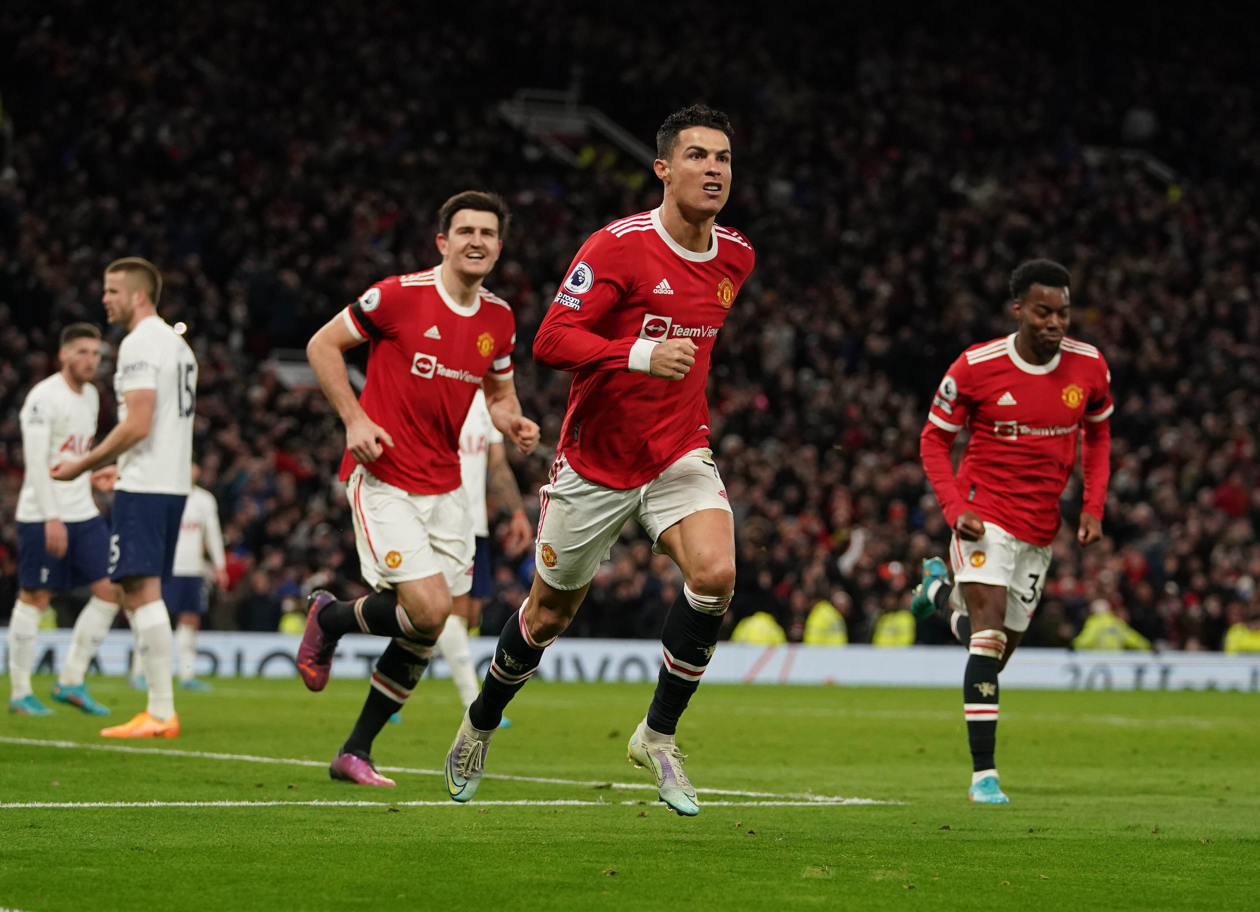 Cristiano Ronaldo led the celebrations after scoring a hat-trick against Tottenham (Martin Rickett/PA)