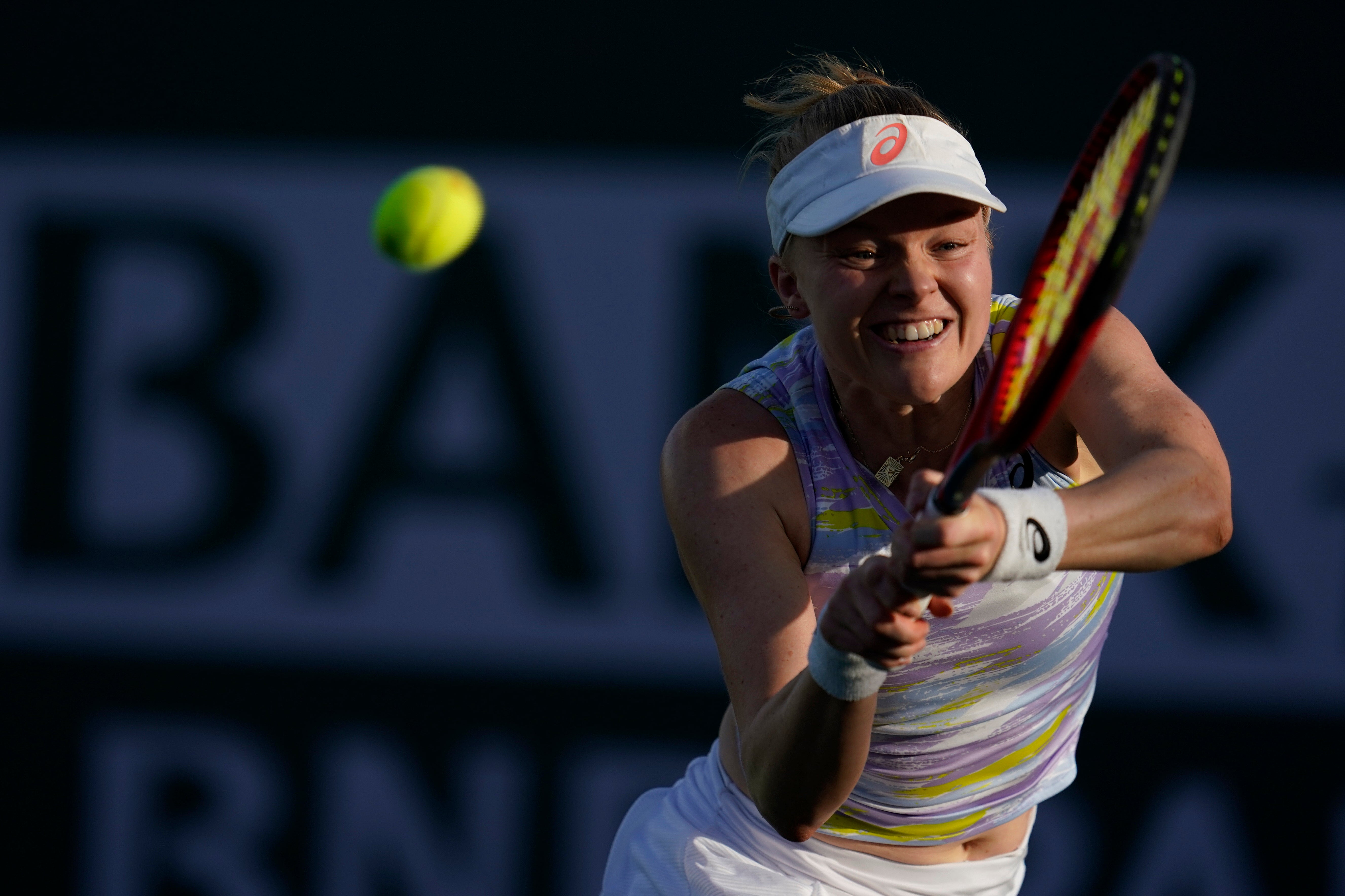 Harriet Dart hits a backhand during her victory over Kaia Kanepi (Marcio Jose Sanchez/AP)