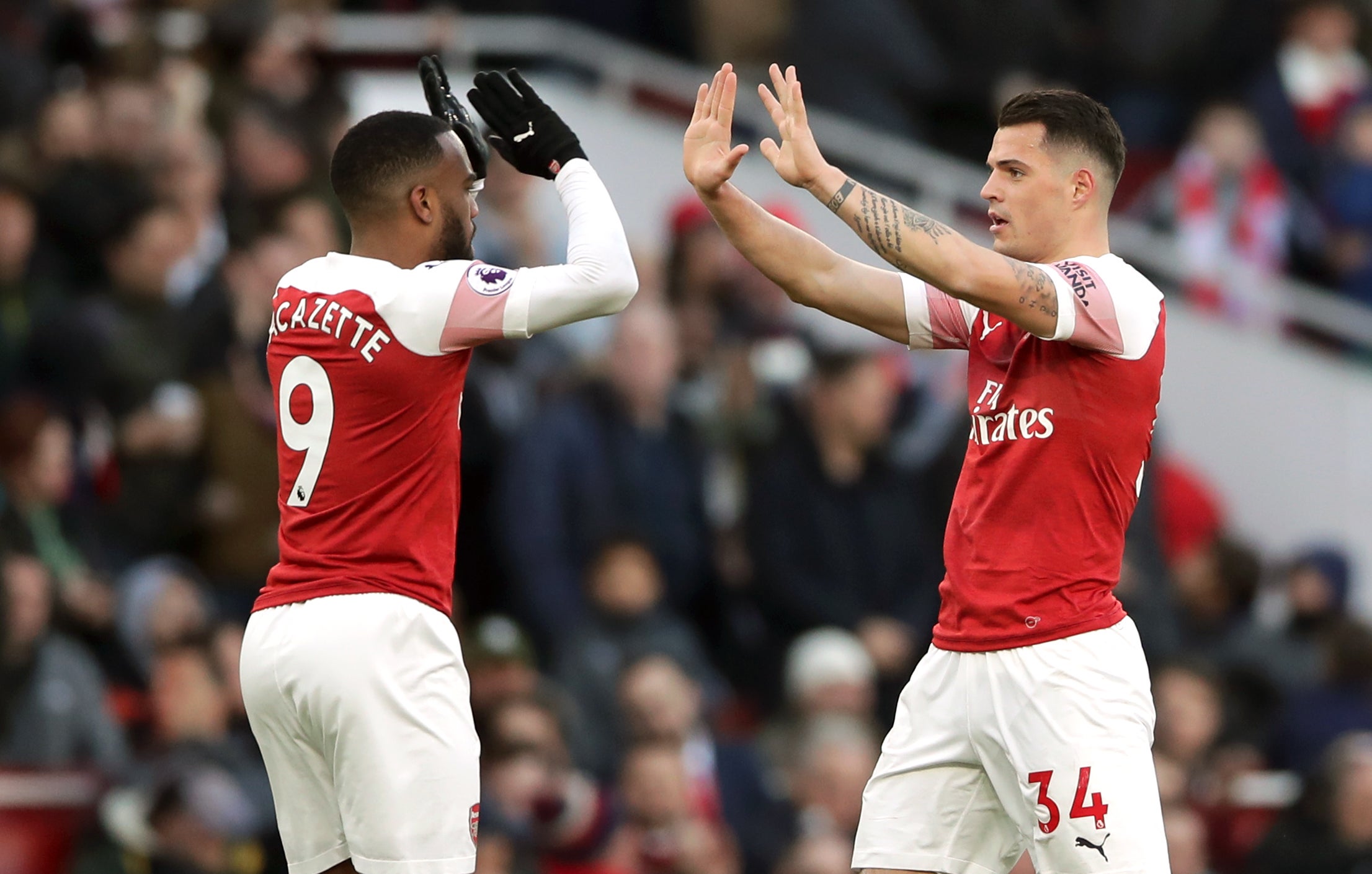 Arsenal’s Granit Xhaka (right) has stressed the importance Alexandre Lacazette has to the team (John Walton/PA)