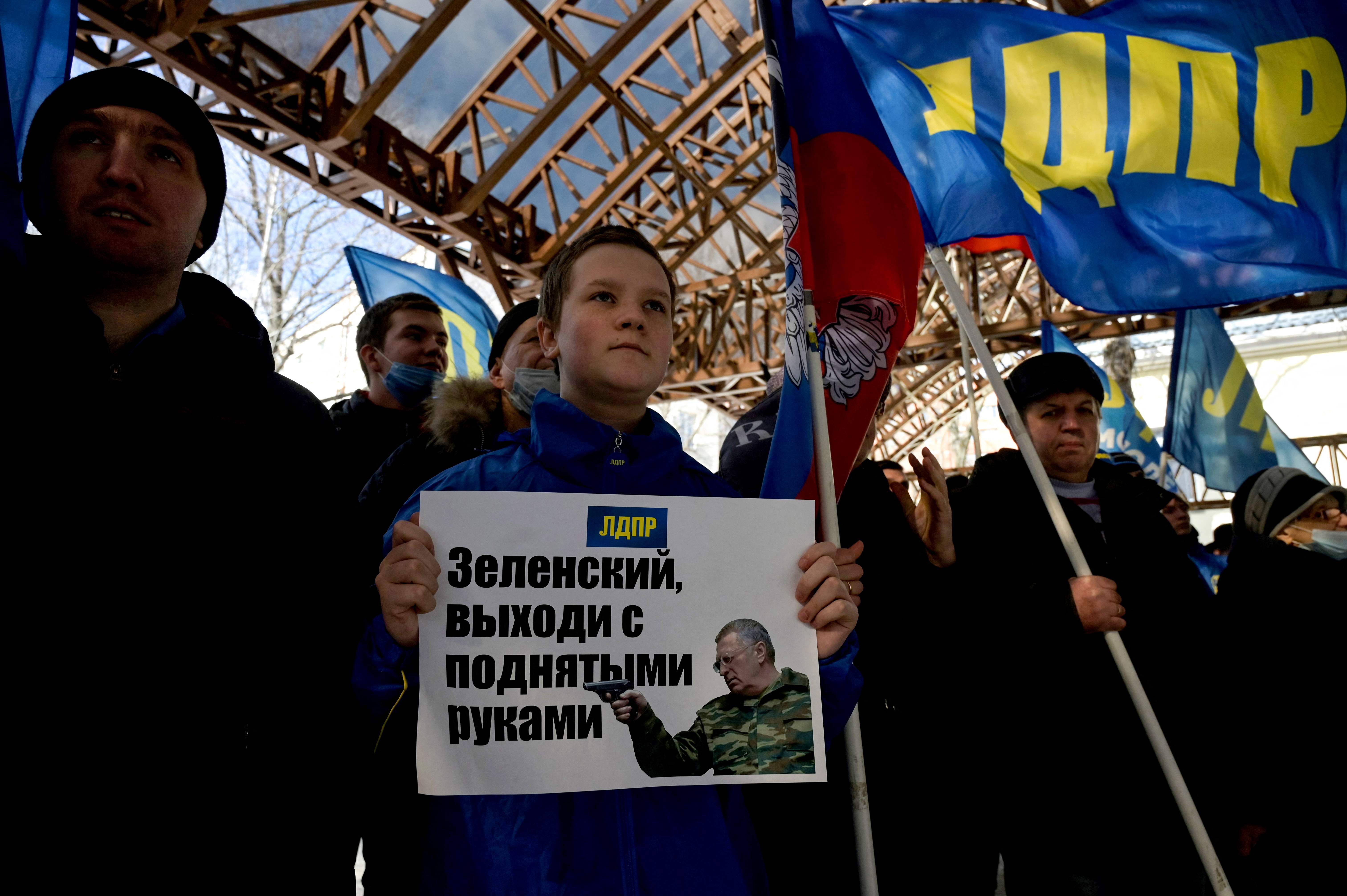 ‘Zelensky, come out with your hands up’: Supporters of the nationalist Liberal-Democratic Party of Russia hold a gathering in support of Russian military action