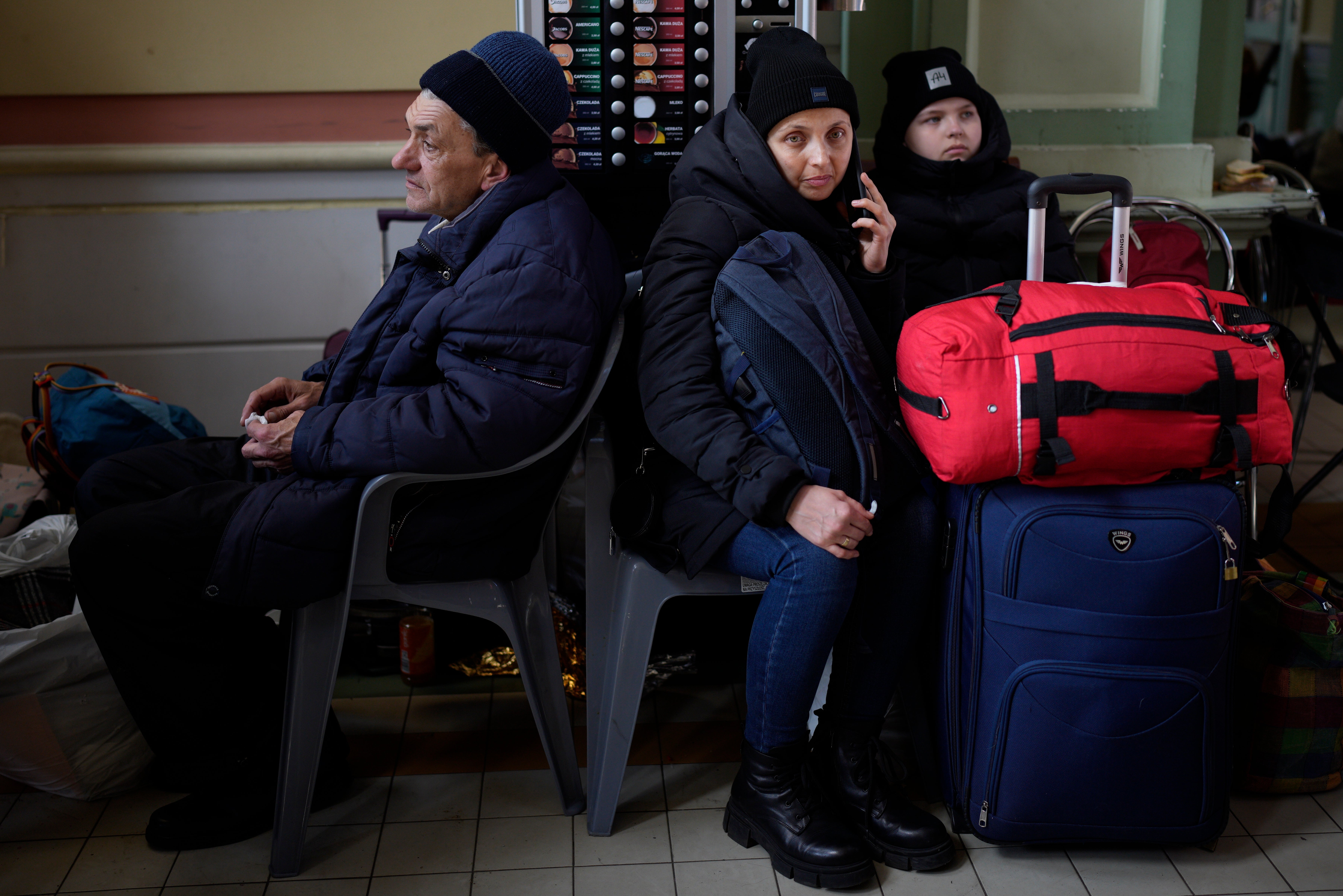 People that fled the war in Ukraine wait at Przemysl train station, in Przemysl, Poland