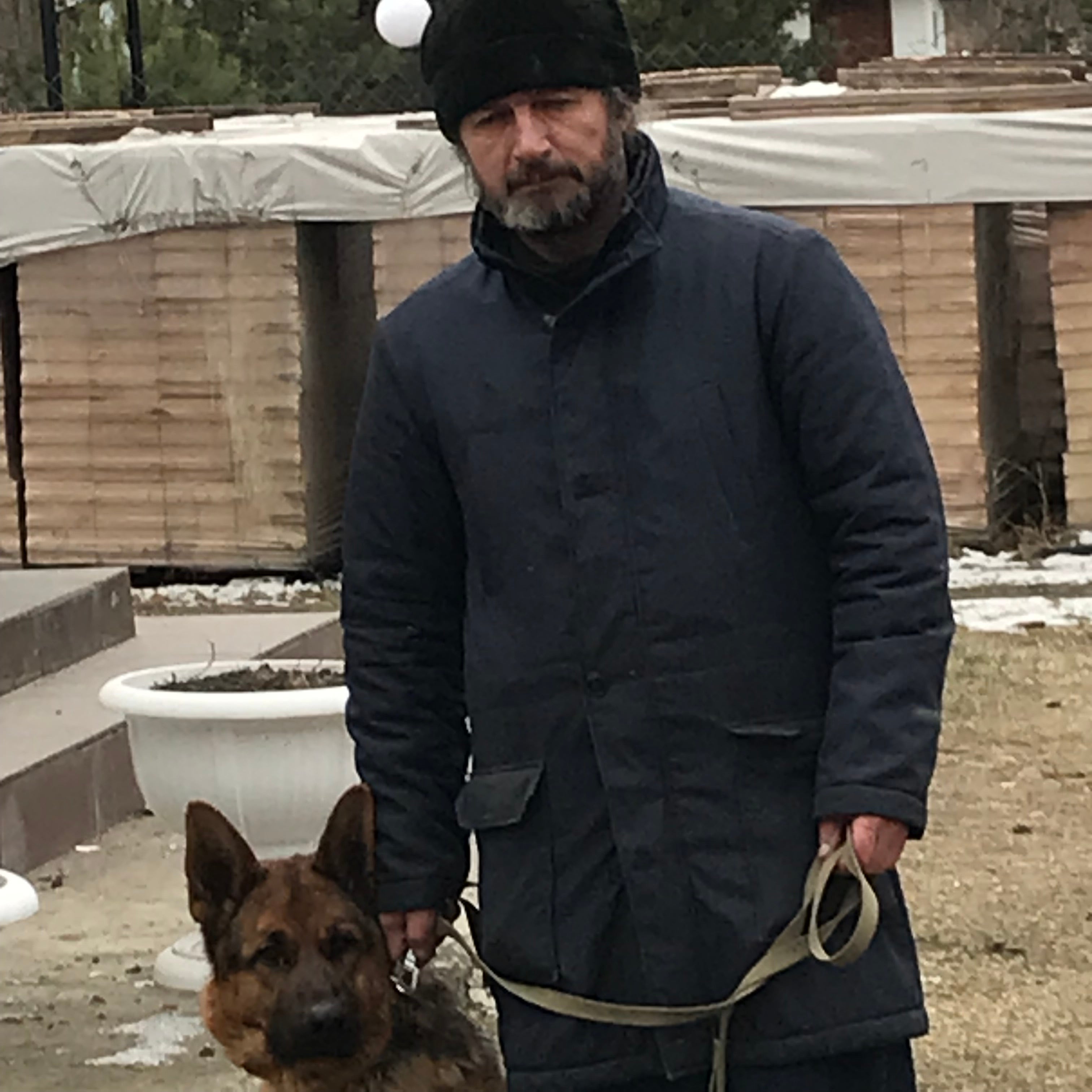 Father Roman with his dog