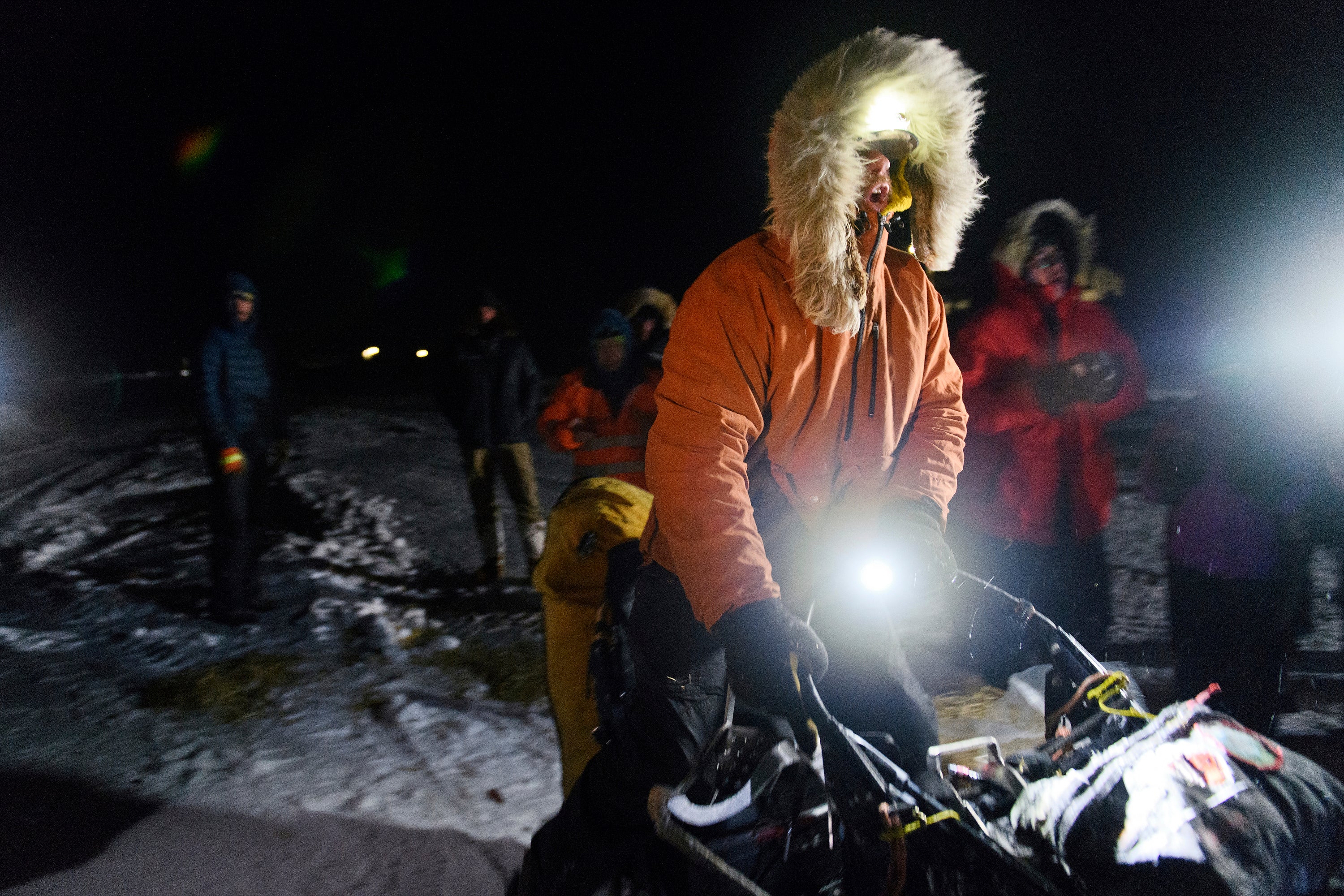 Musher Brent Sass calls for his team to go as he departs the Iditarod Trail Sled Dog Race in Unalakleet, Alaska on Saturday, March 12, 2022