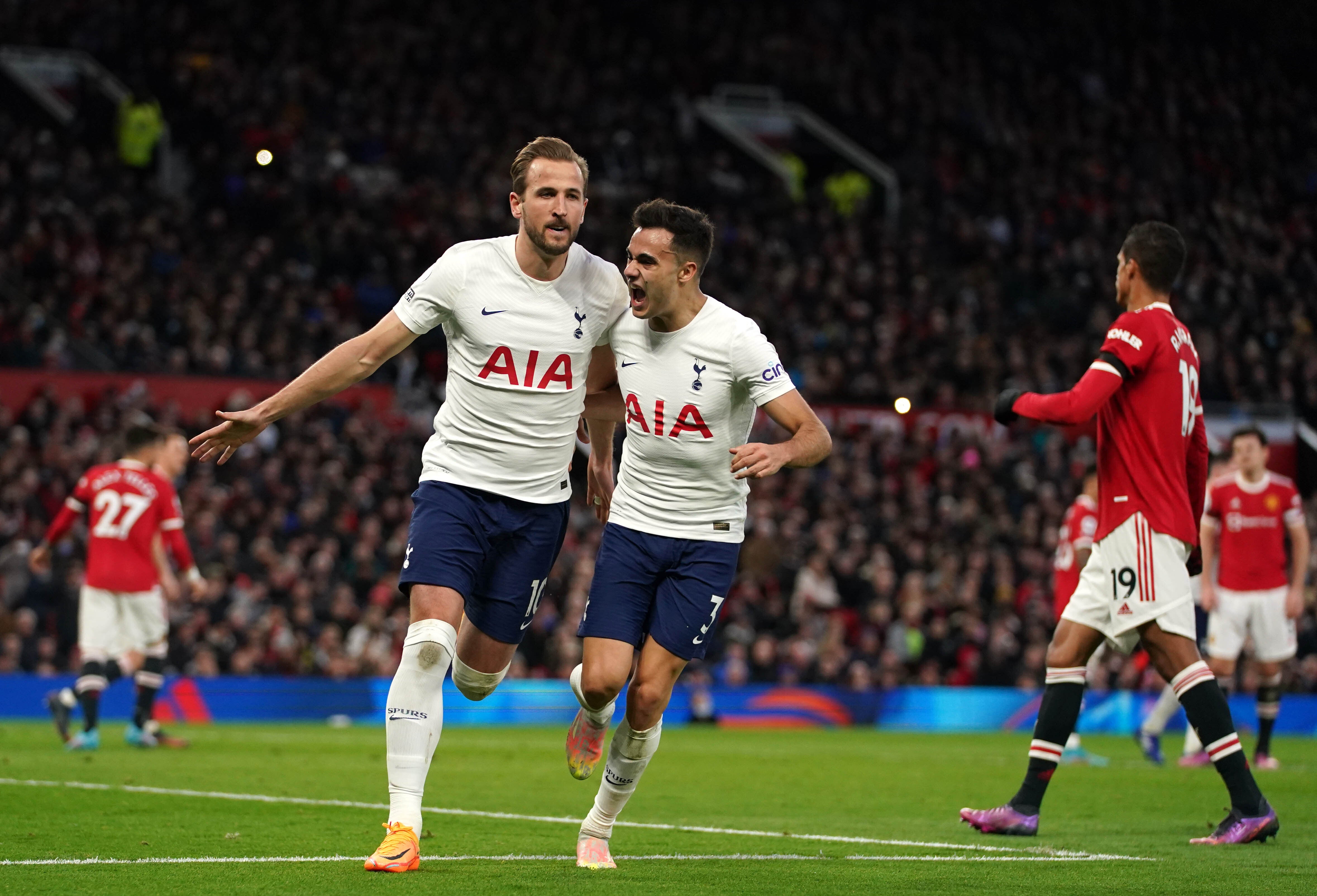 Harry Kane, celebrates scoring his 11th league goal of the season from the penalty spot in Saturday’s defeat at Old Trafford (Martin Rickett/PA)