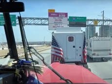 ‘People’s Convoy’ tuckers enter Washington DC for first time as police close streets into the city