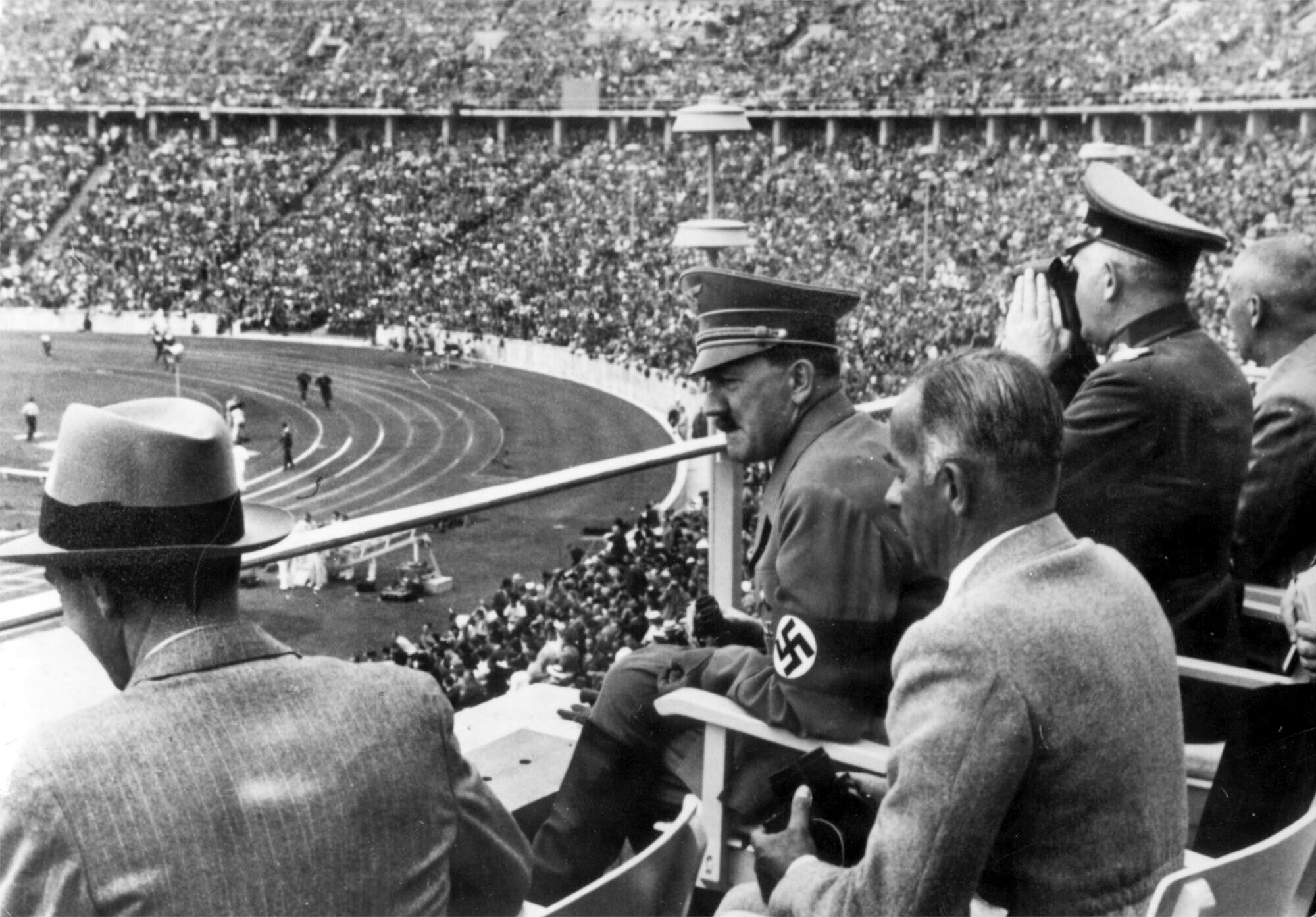 From left to right, Dr. Joseph Goebbels, Adolf Hitler, Reichs Sports Leader Hans von Tschammer und Osten and General Field Marshall Werner von Blomberg observe the Olympic Games in Berlin in August 1936