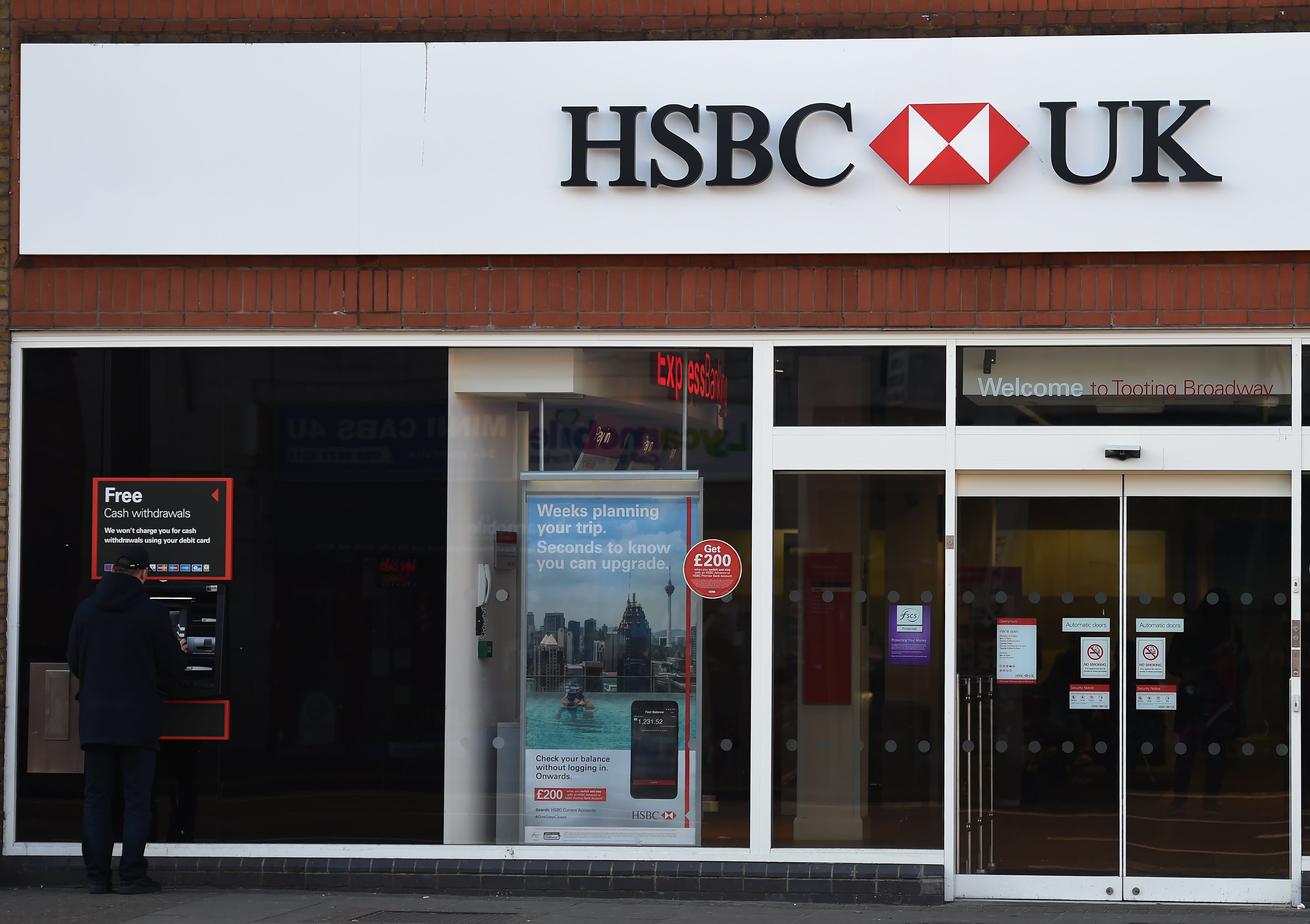 HSBC has said it will shut 69 bank branches as it continues to cut site numbers due to customers switching to online banking (Charlotte Ball/PA)