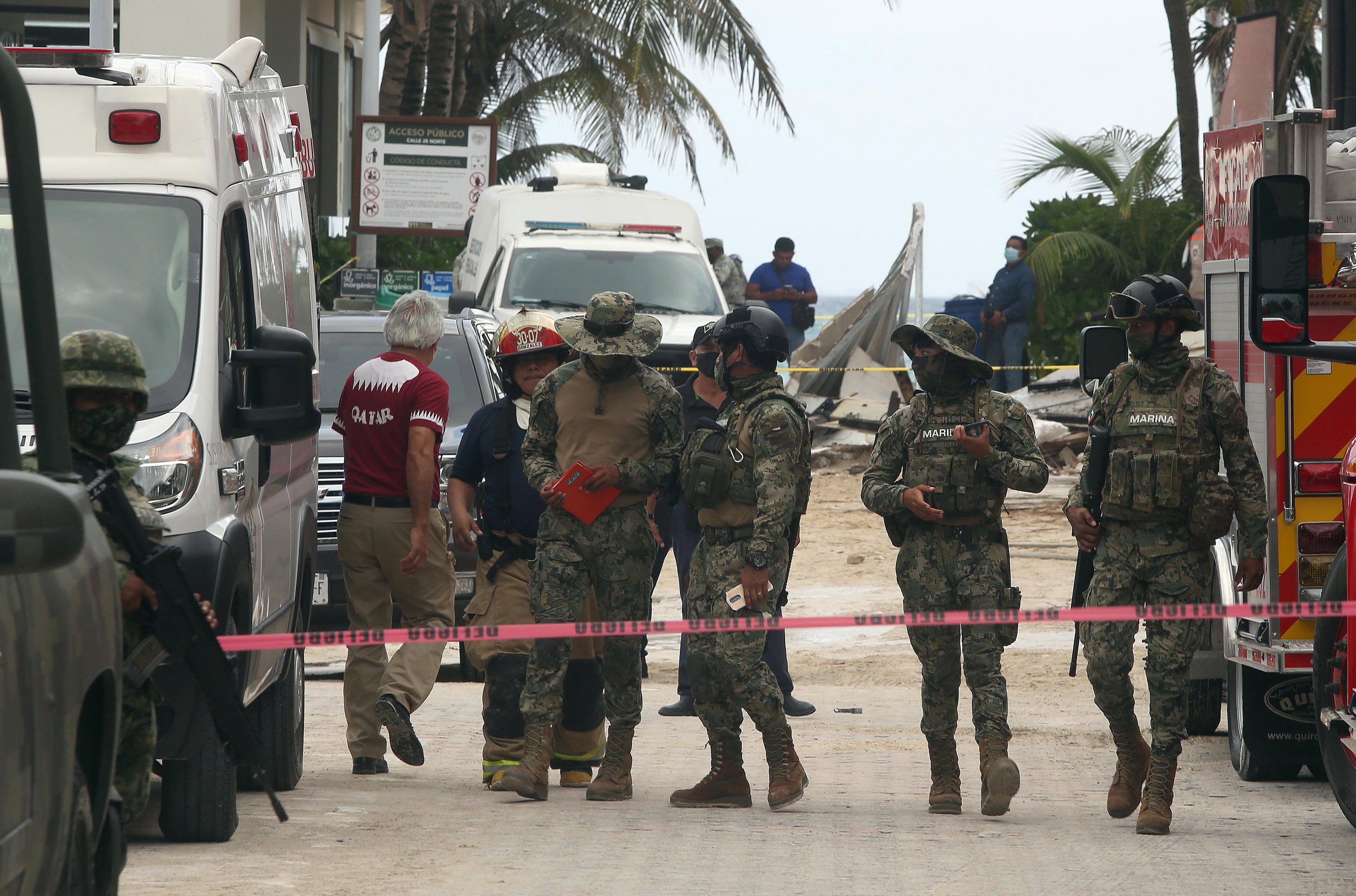 Members of the Mexican Army secure an area near a restaurant where there was an explosion in the kitchen area of a Kool Beach beach club in Playa del Carmen, in the state of Quintana Roo, Mexico, 14 March 2022