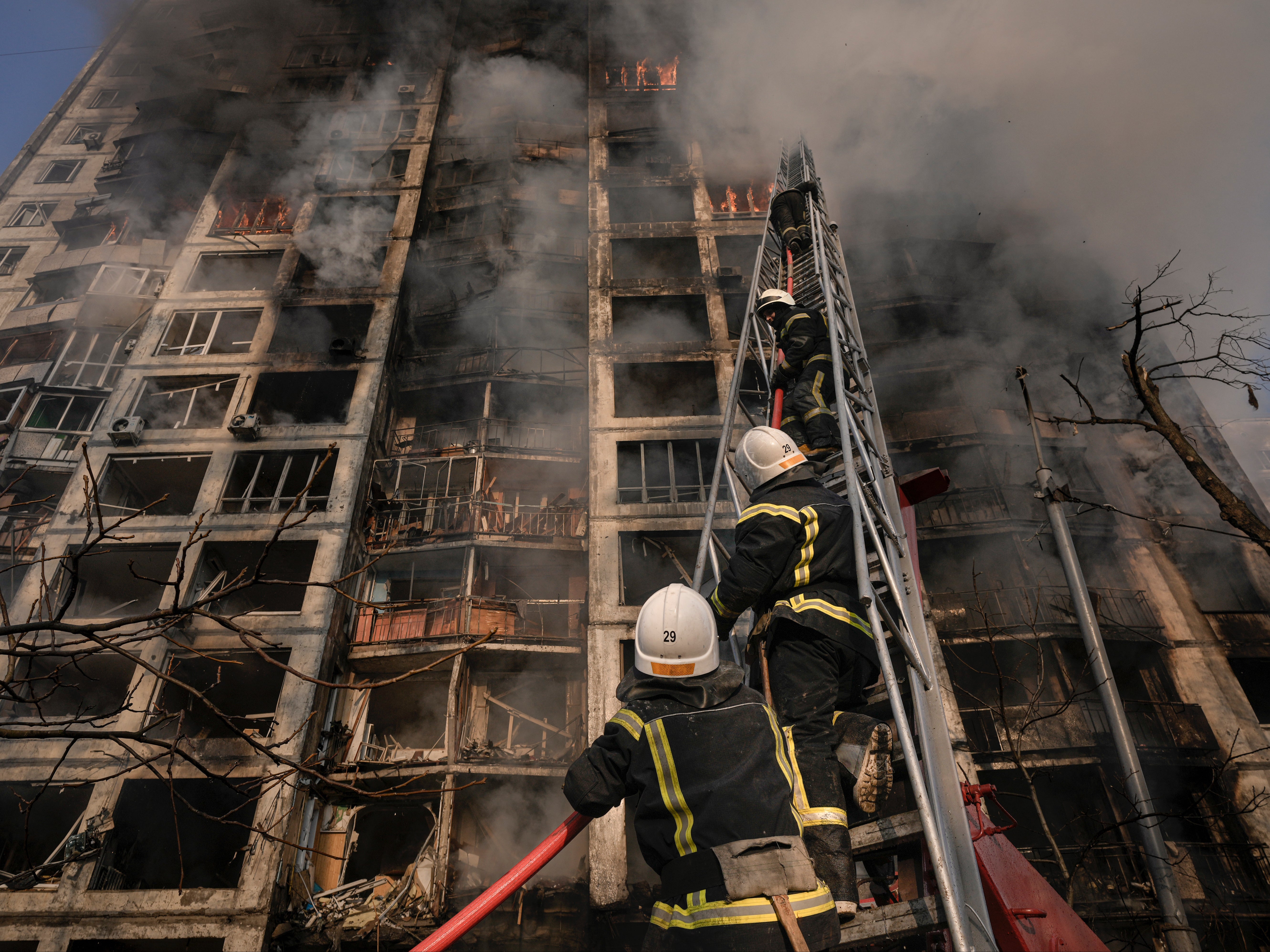 Firefighters battling a blaze in a Kyiv tower block