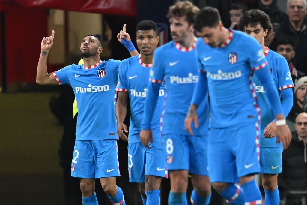 Brazilian defender Renan Lodi (L) celebrates after scoring the decisive goal