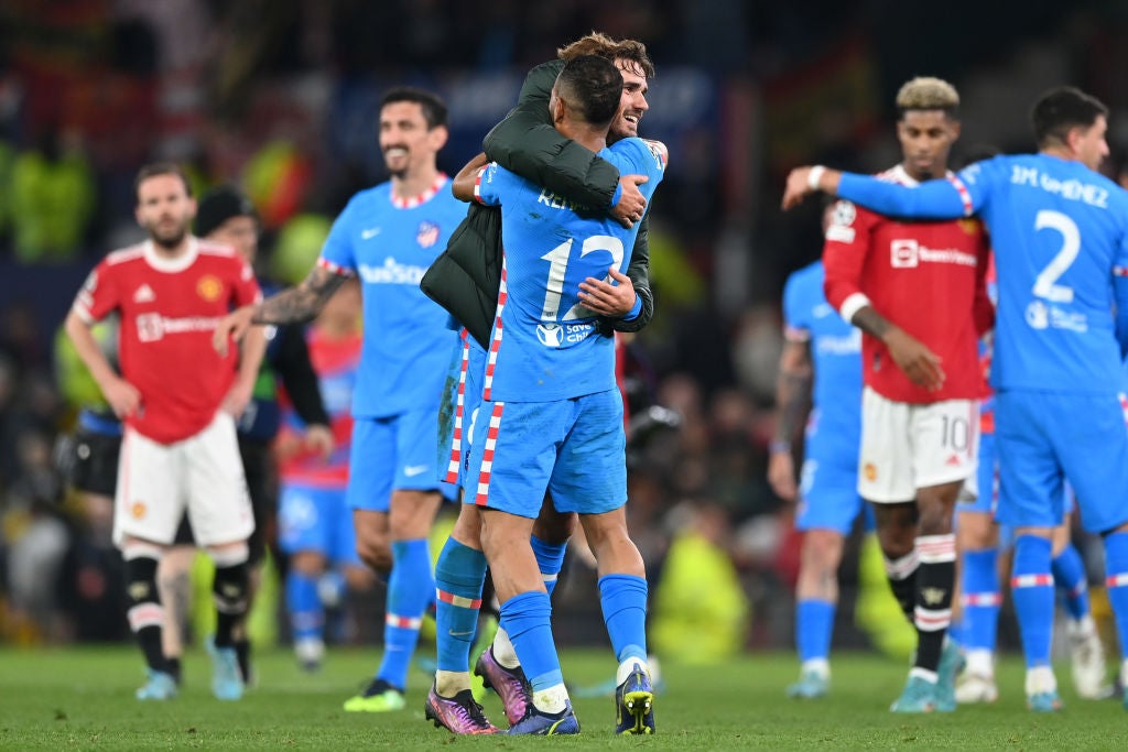 Antoine Griezmann celebrates reaching the quarter-finals with Renan Lodi