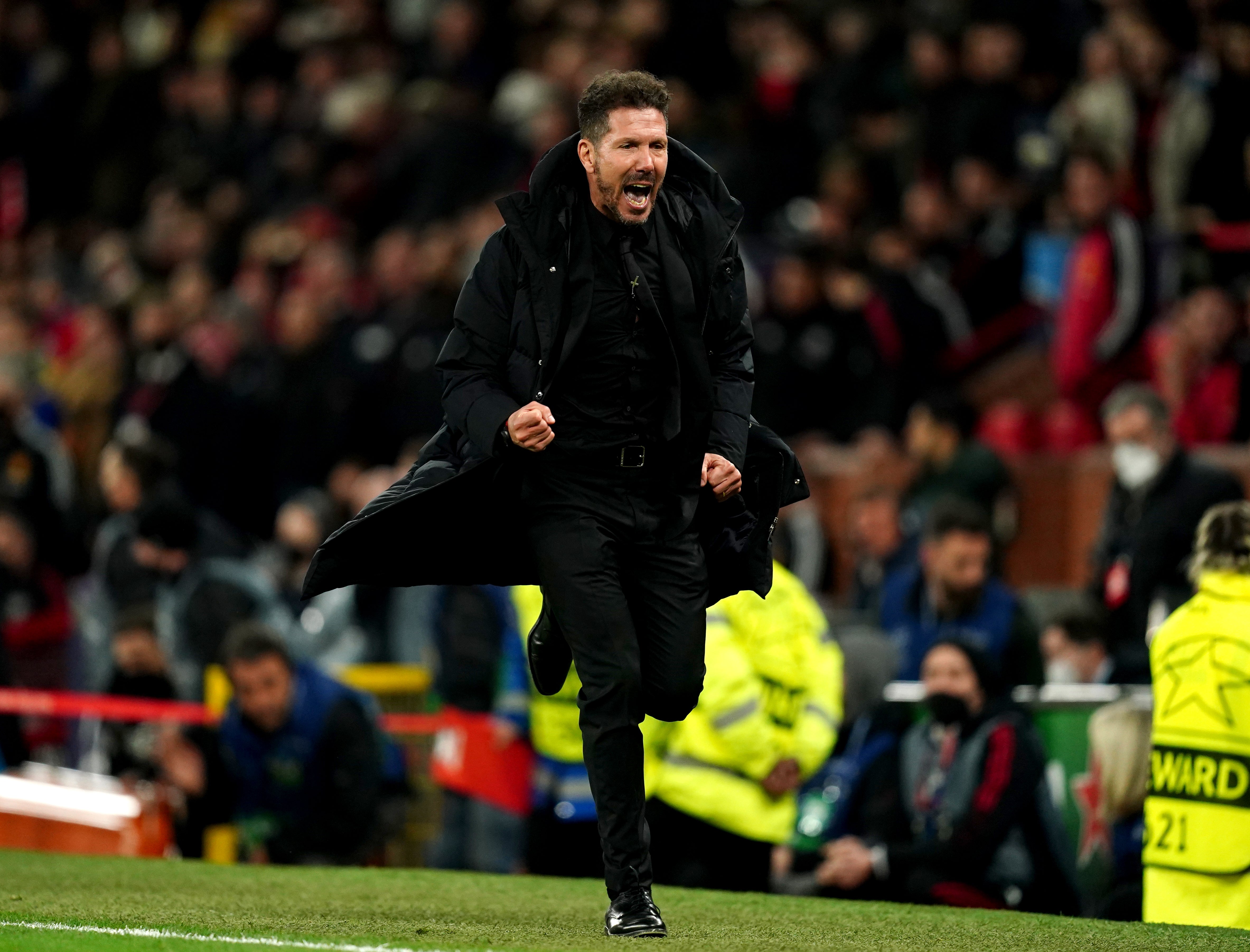 Diego Simeone runs off in celebration (Martin Rickett/PA)