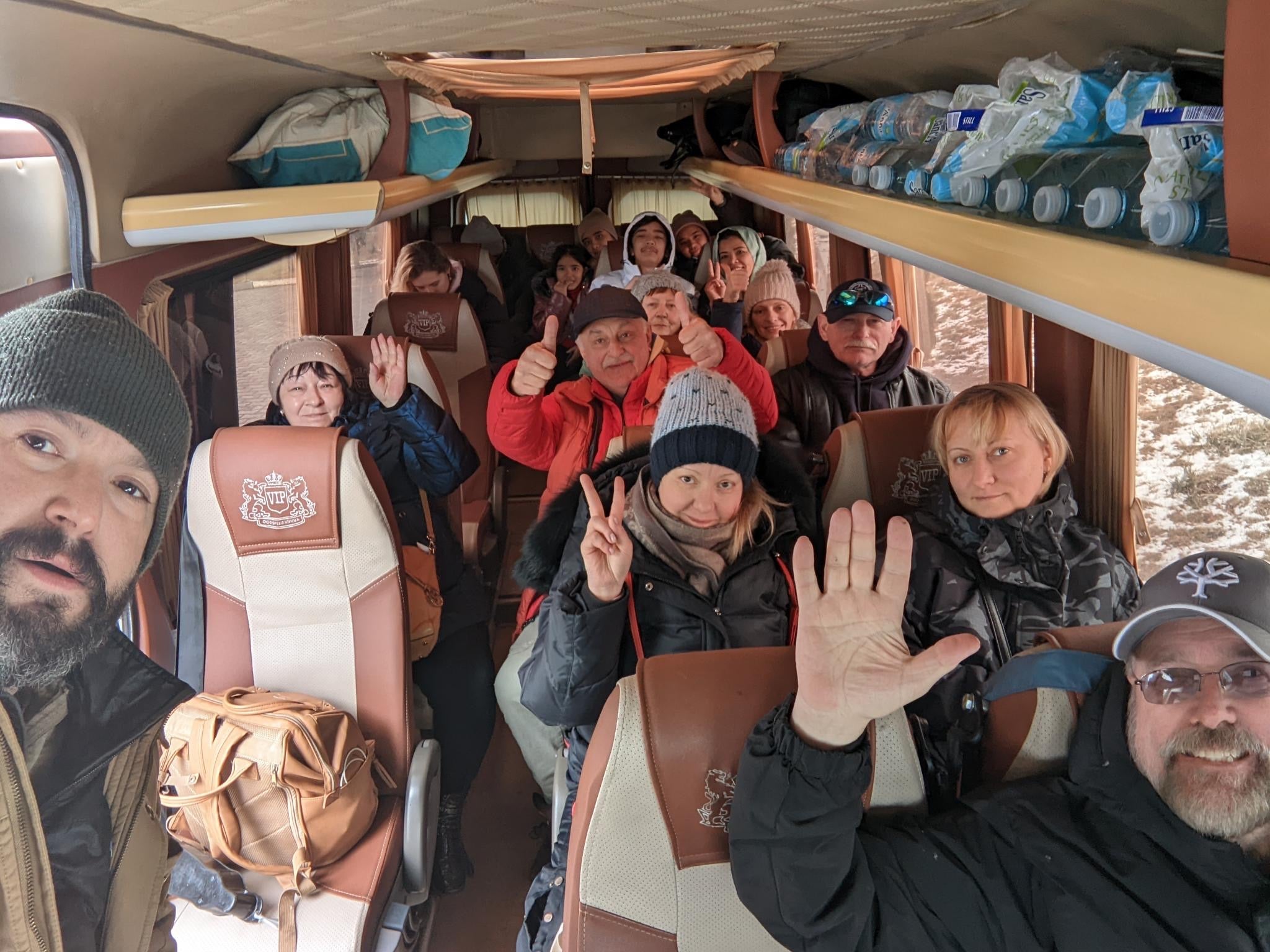 A bus full of people are evacuated out of Ukraine by Bryan Stern on 4 March