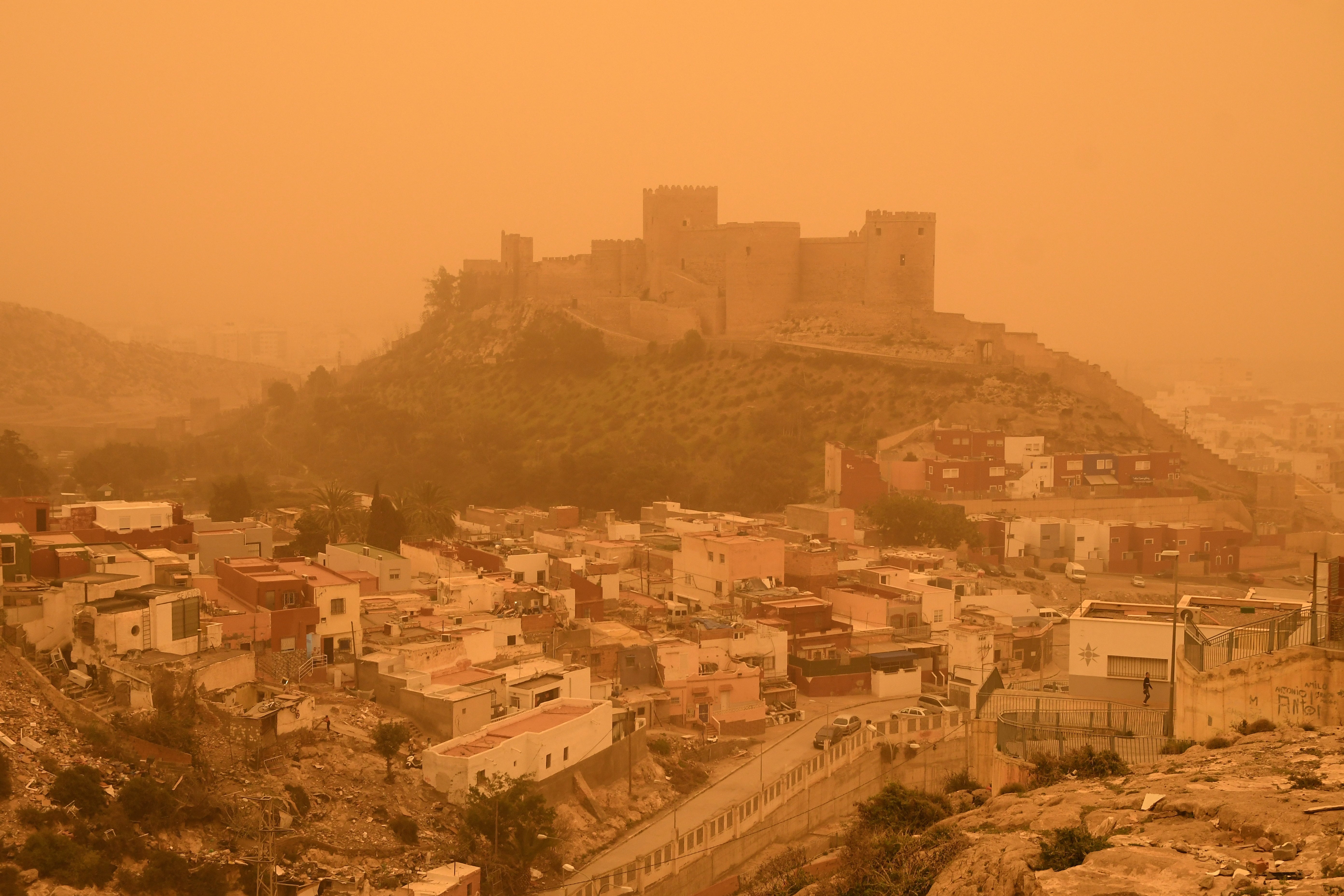 Spain’s Almeria fortress in an orange haze yesterday