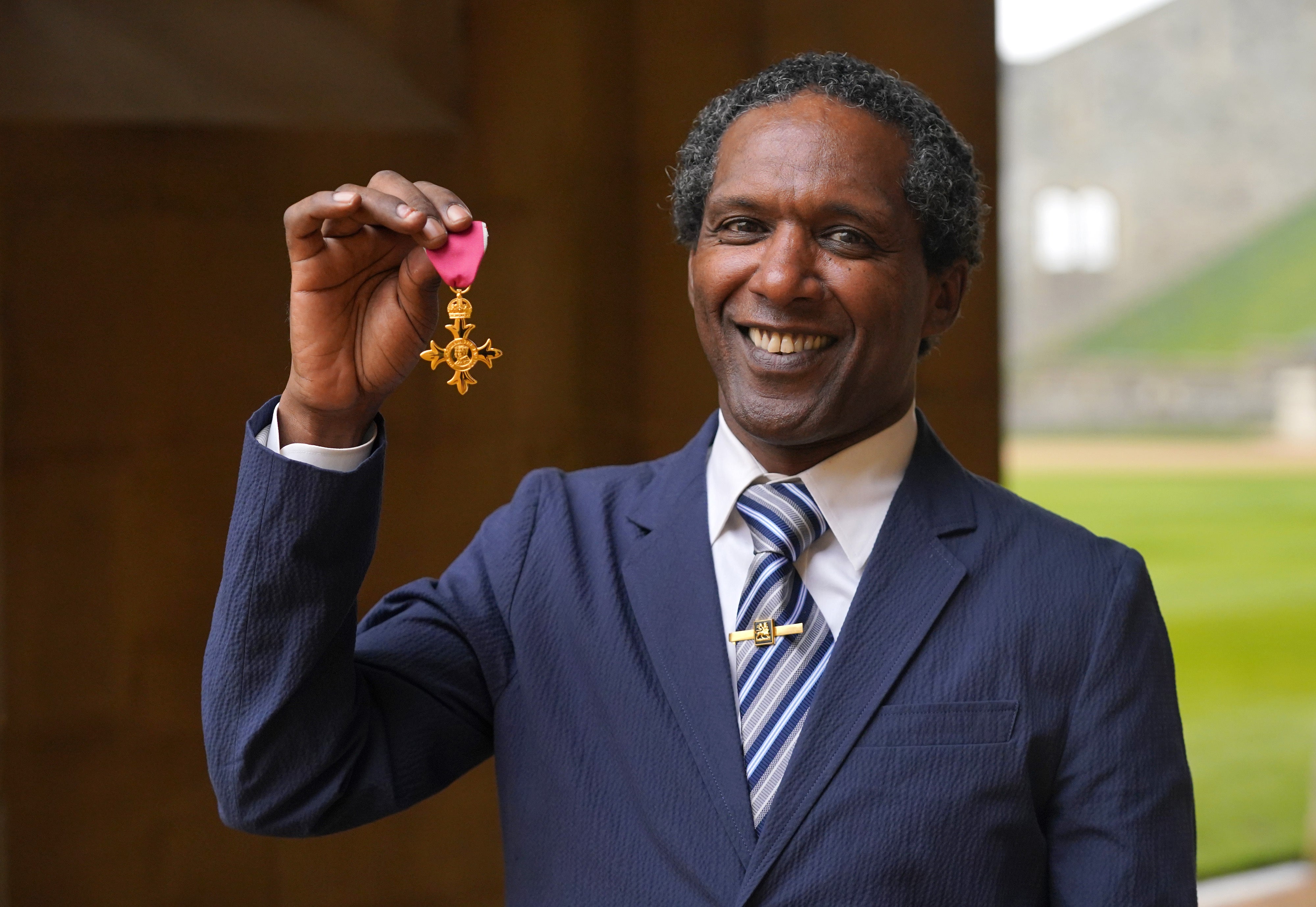 Lemn Sissay after being made an OBE (Officer of the Order of the British Empire) by the Prince of Wales during an investiture ceremony at Windsor Castle (Jonathan Brady/PA)