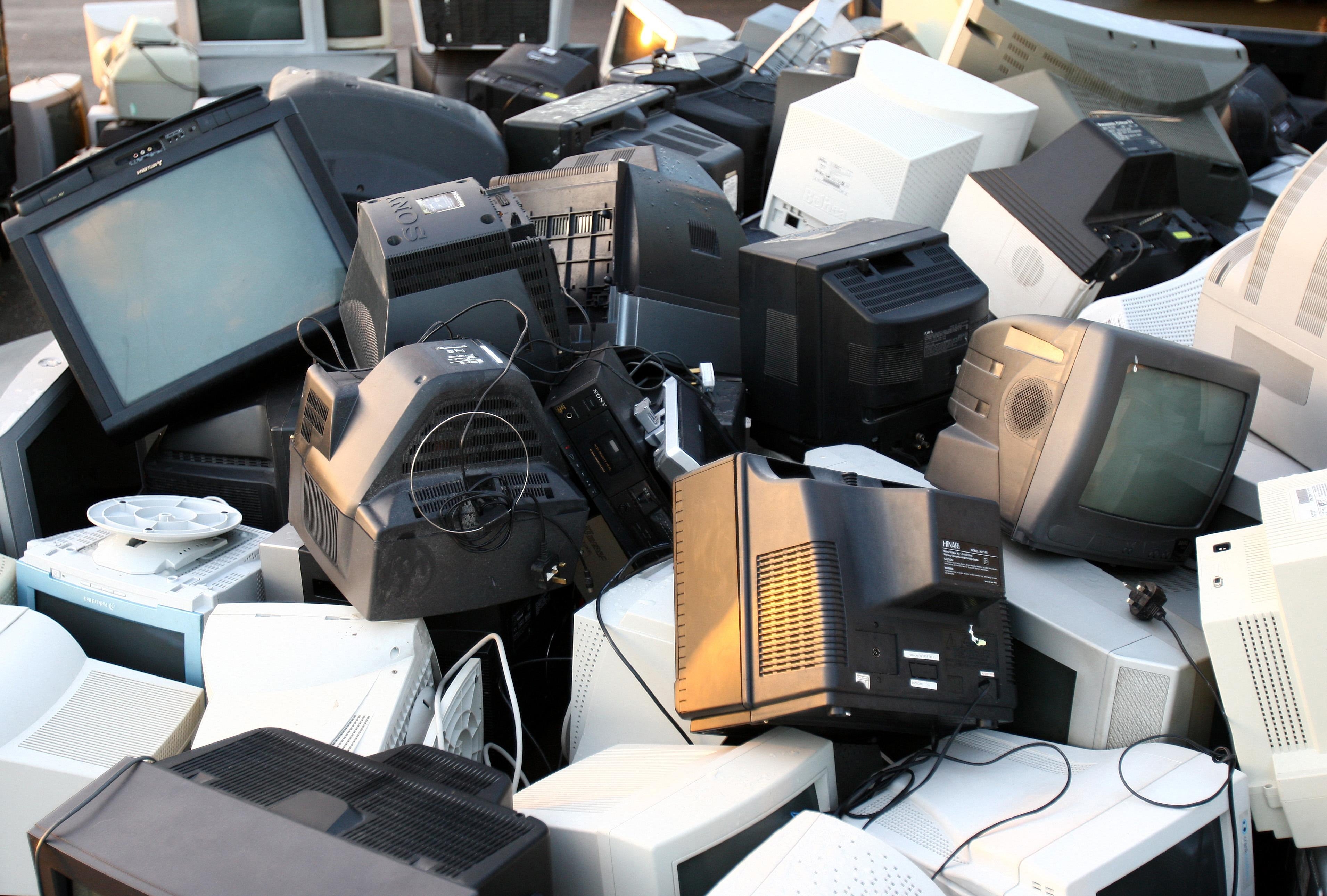 Televisions are recycled at Polmaise recycling plant in Stirling. Currys have launched a new recycling scheme for similar items (Andrew Milligan/PA)