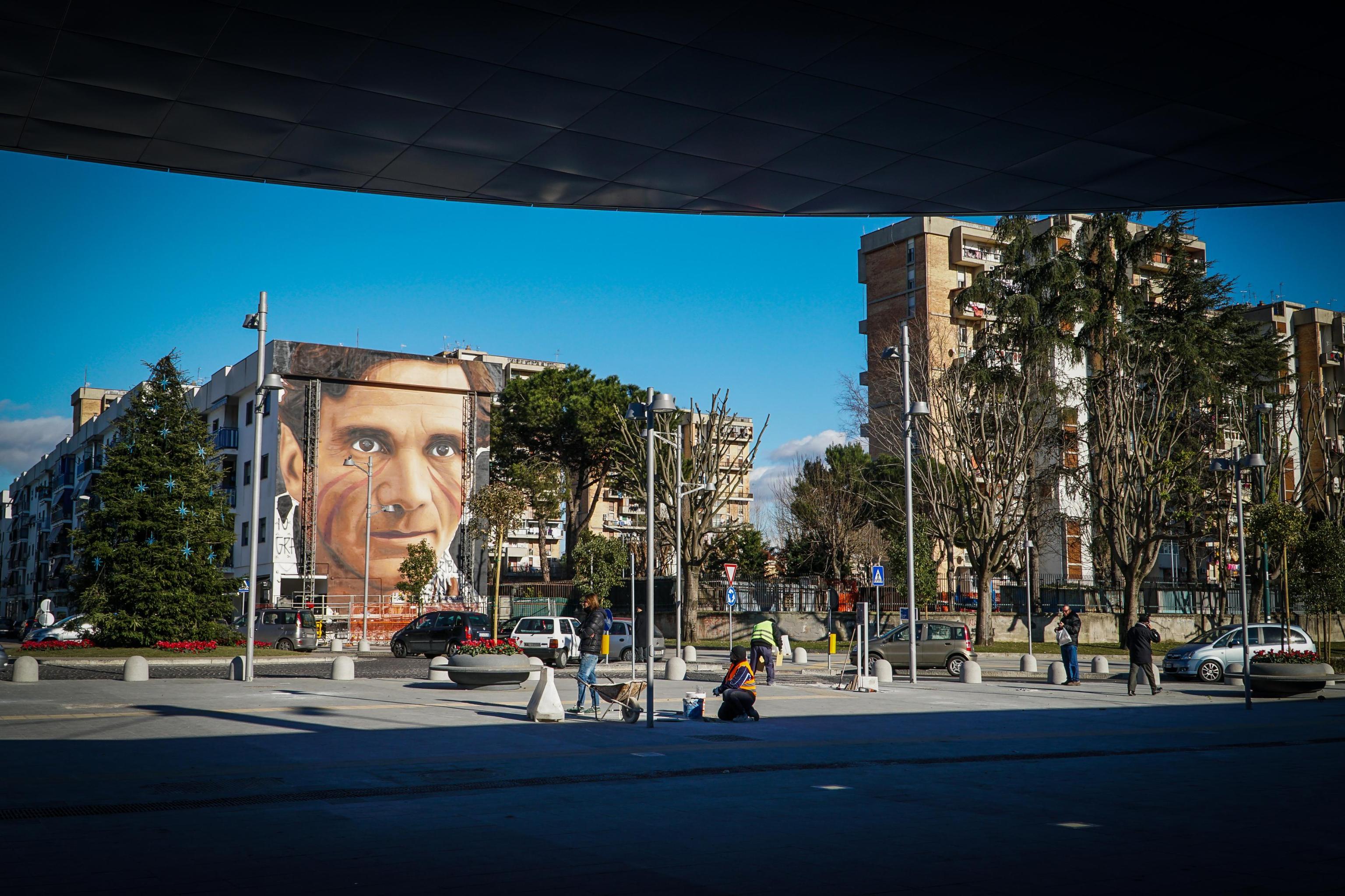 A mural of Pasolini by Italian artist Jorit Agoch in the Scampia district of Naples, 2019