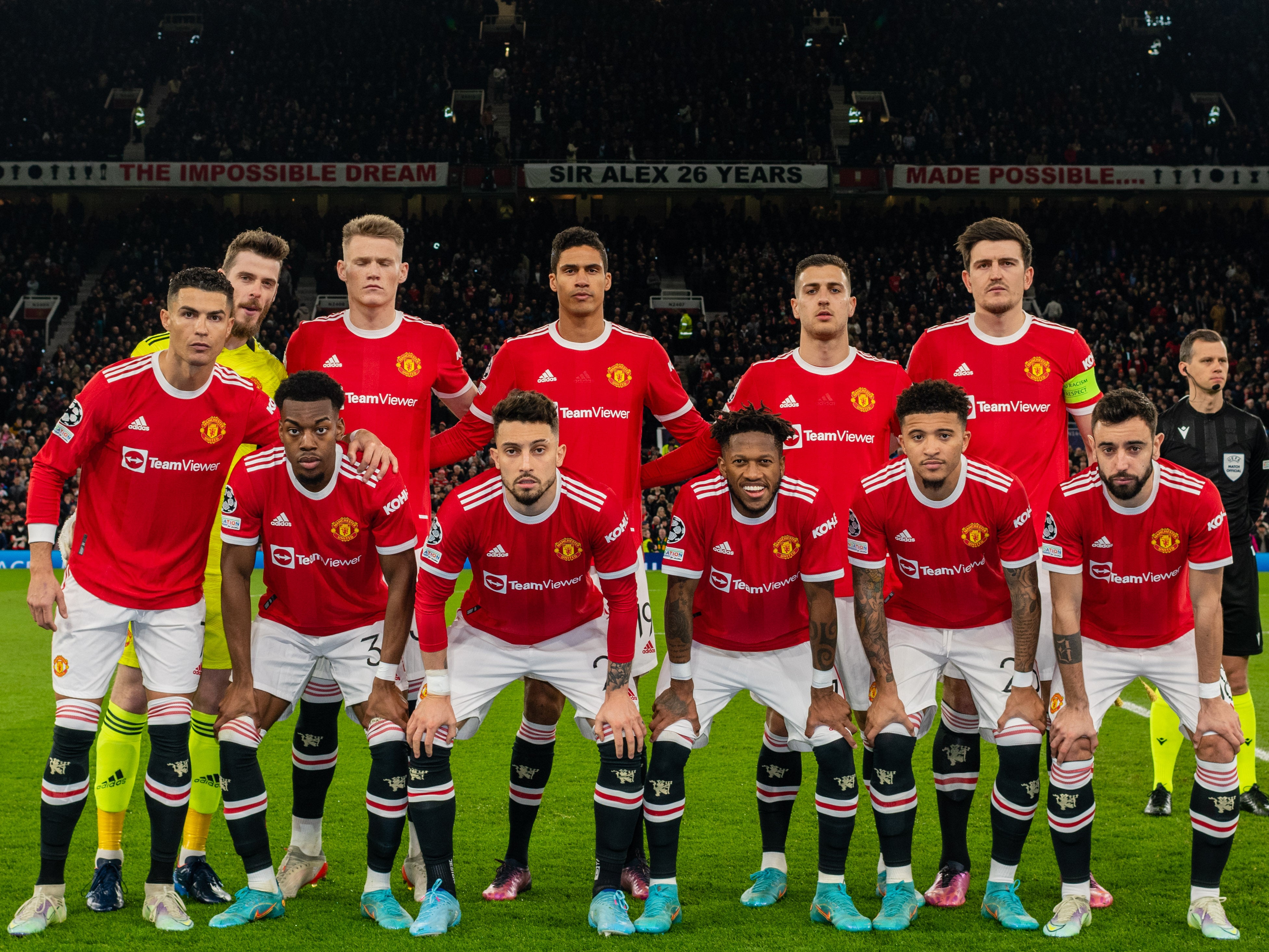 Manchester United’s players line up before their Champions League defeat to Atletico Madrid