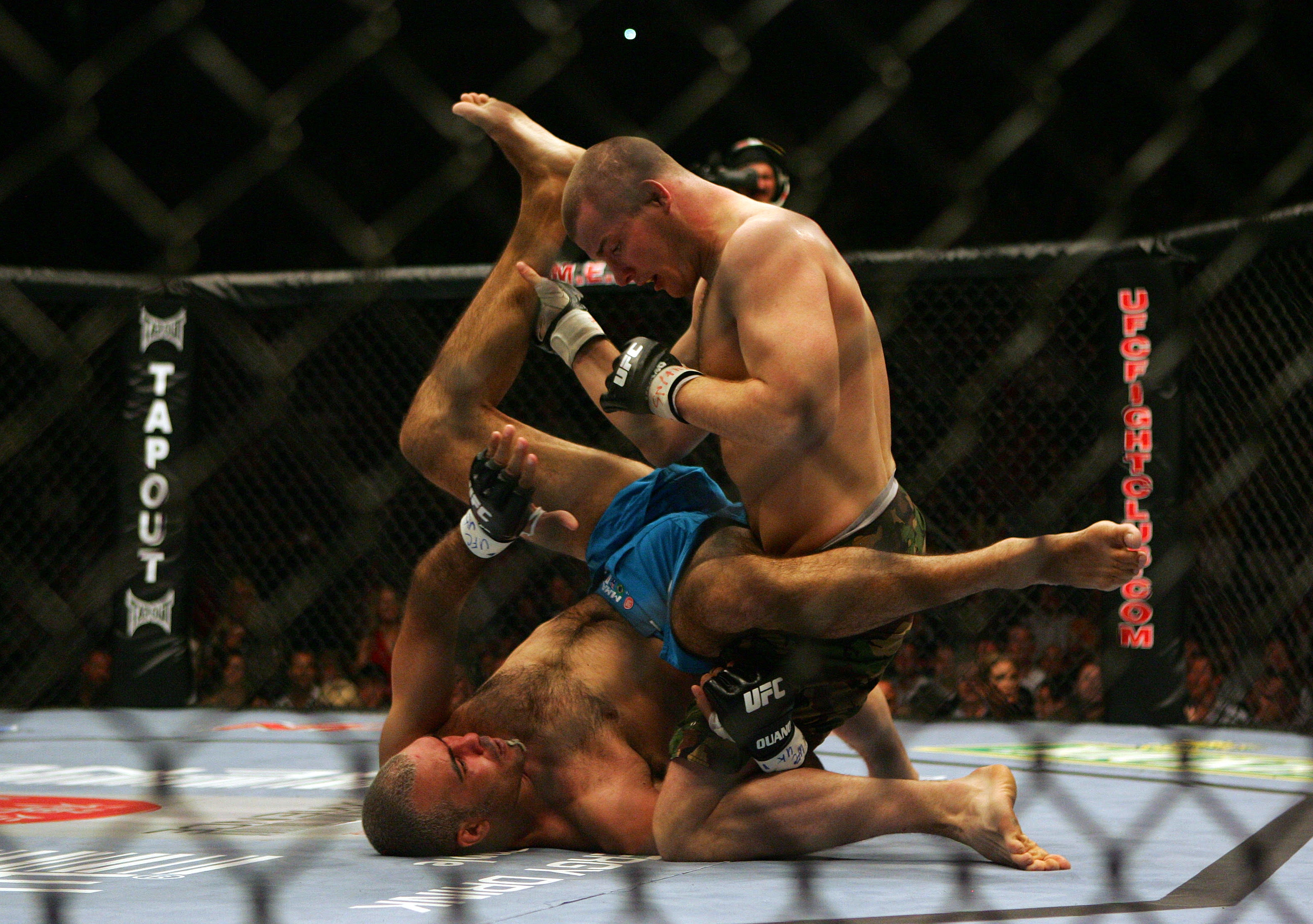 Bisping (top) in his first UFC event in the UK, beating Elvis Sinosic