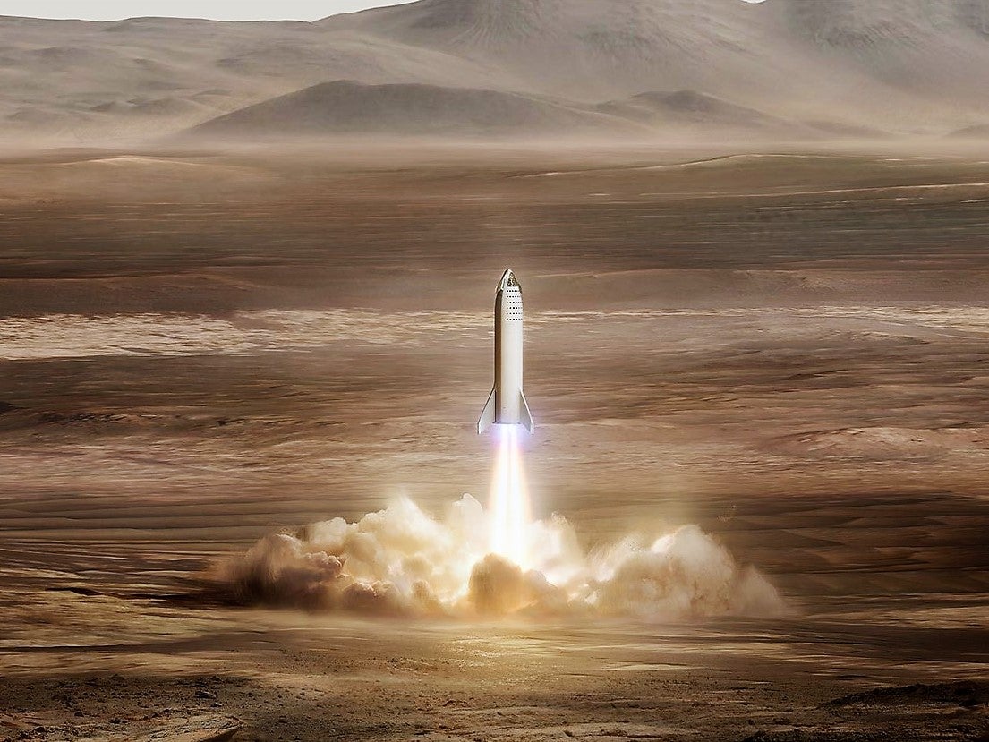 An illustration of SpaceX’s Starship rocket landing on Mars