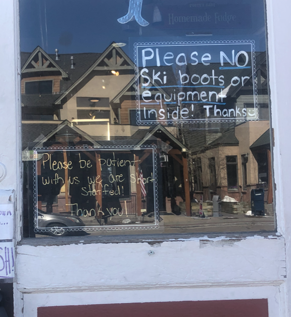 The door of Foote’s Rest Sweet Shoppe on Main Street in Frisco pleads for patience given staff shortages