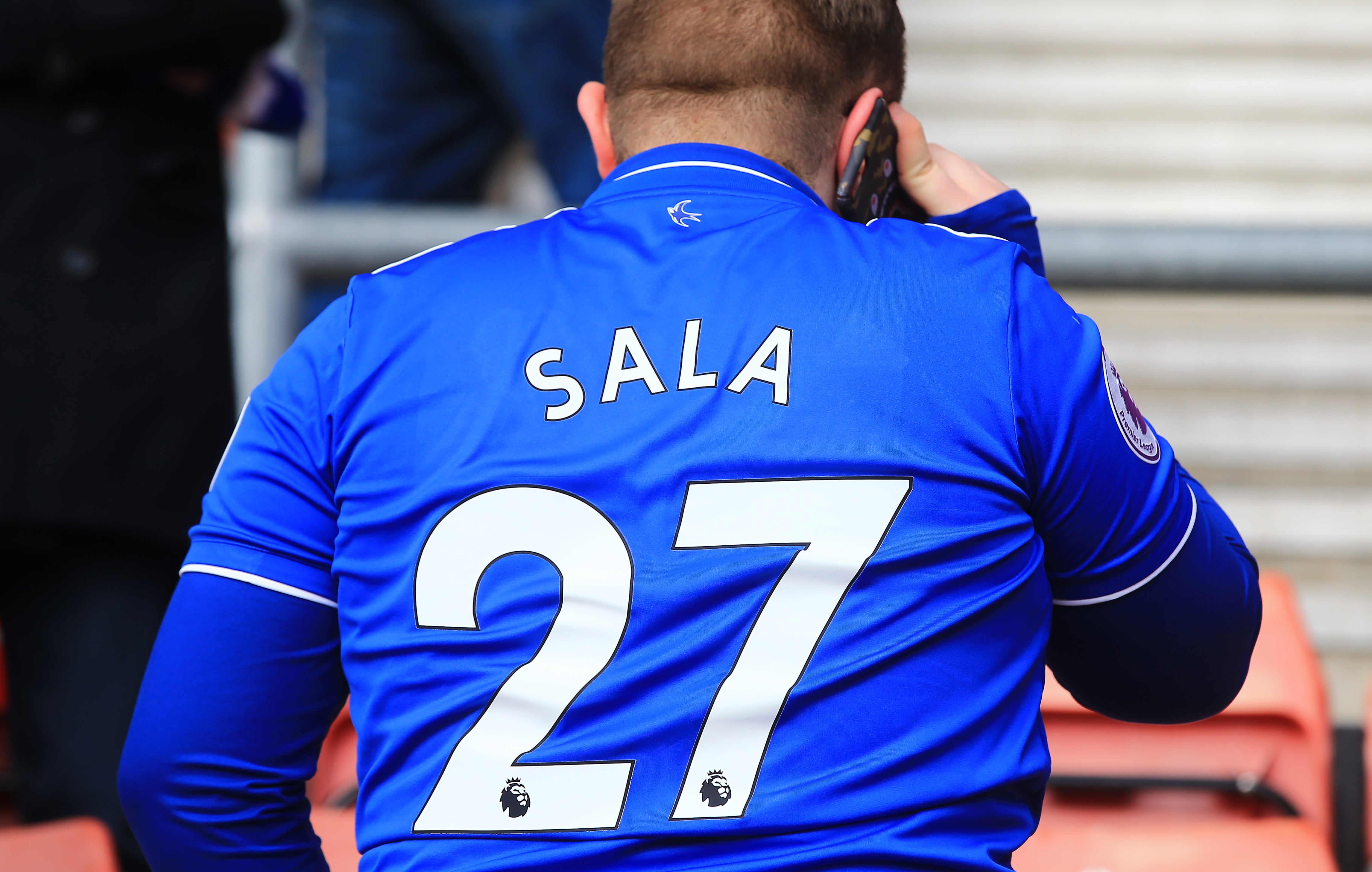 A fan wears a tribute shirt for the late Emiliano Sala during the Premier League match at St Mary’s Stadium, Southampton.