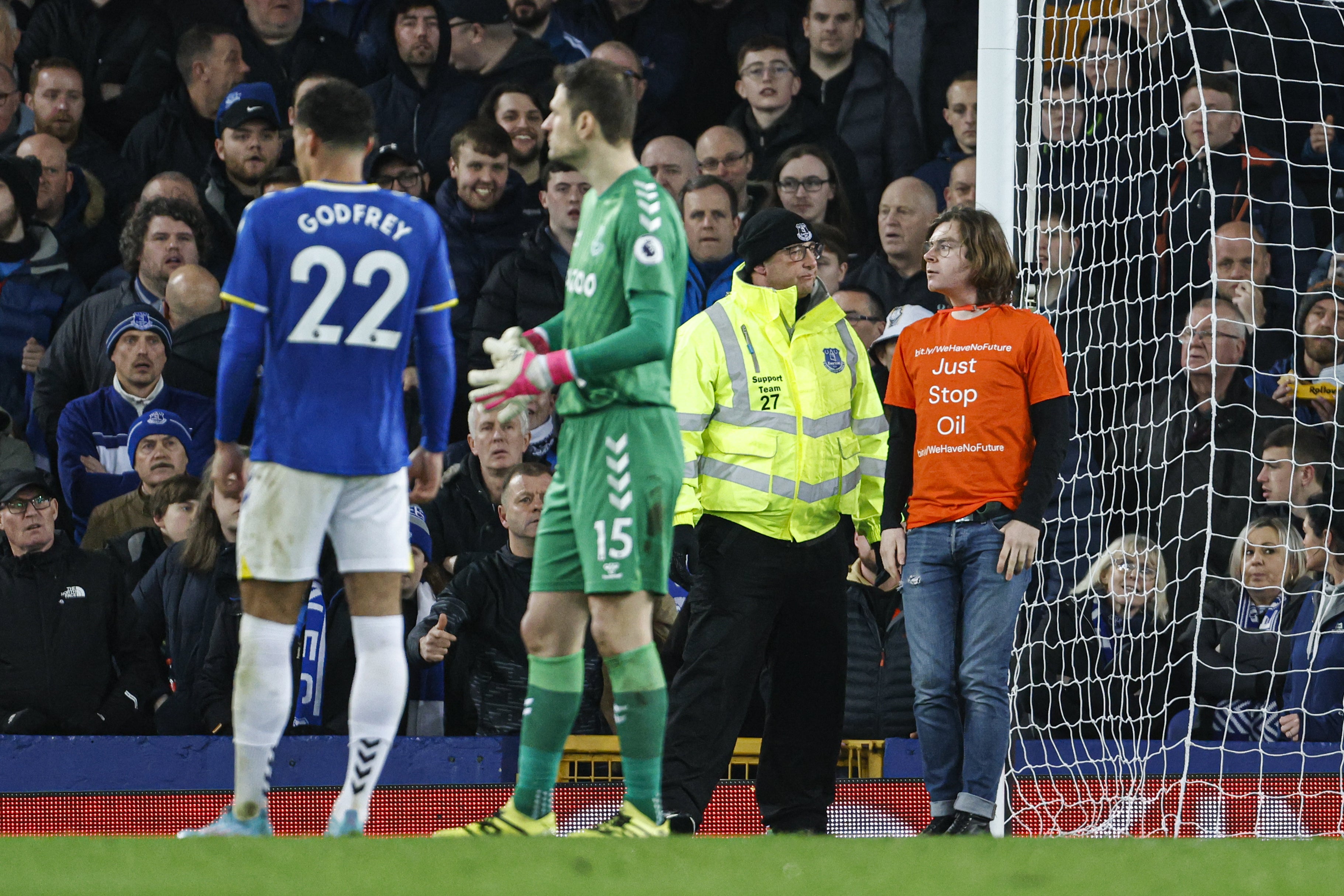 A protester tied himself to a post at Goodison Park (Richard Sellers/PA)