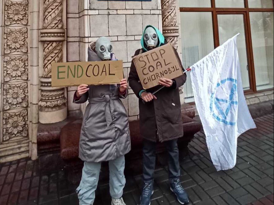 Grisha (right), who founded XR Ukraine, with fellow XR activist Nastya (left) at a protest