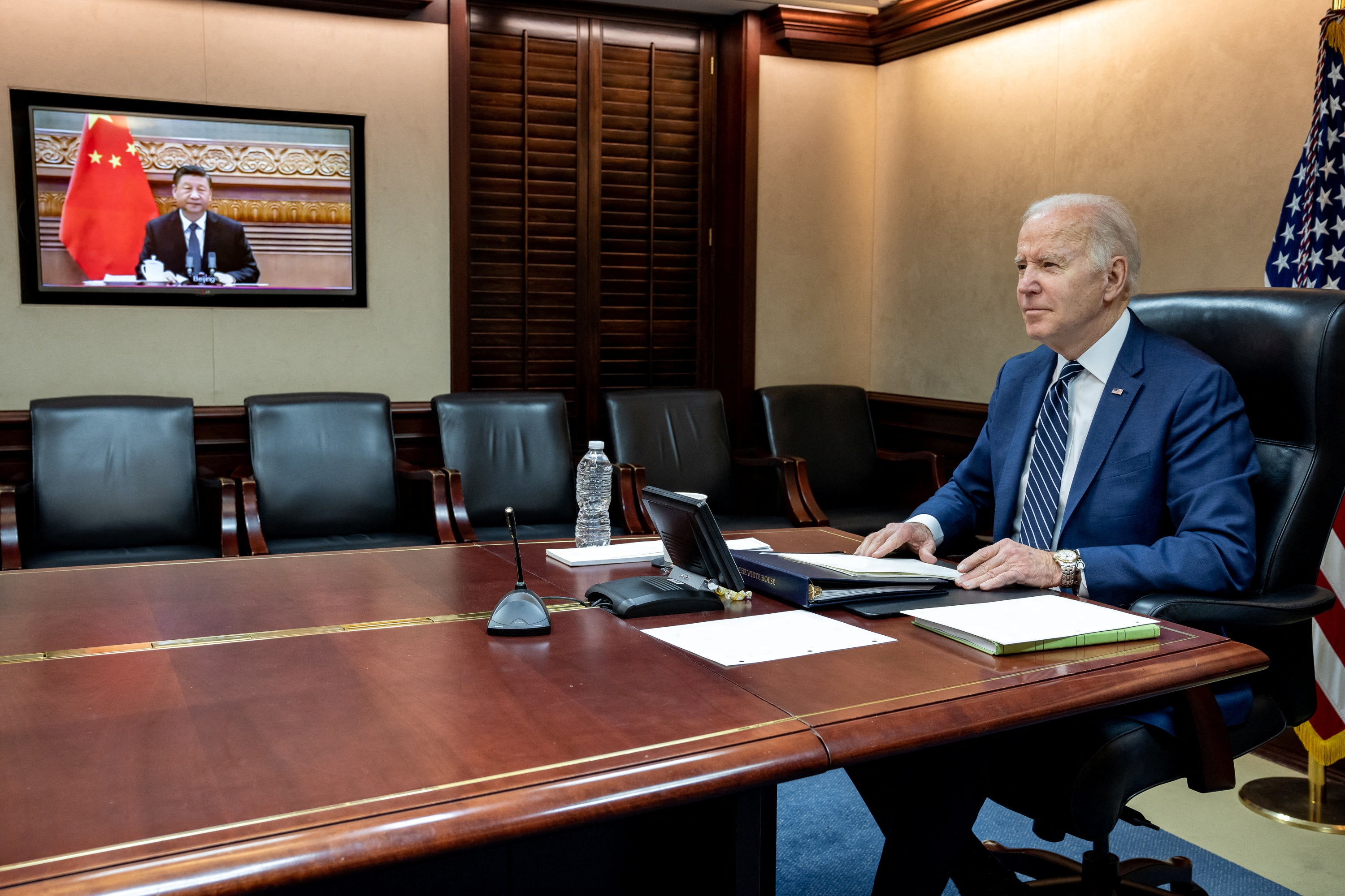 President Joe Biden holds virtual talks with Chinese President Xi Jinping from the Situation Room at the White House in Washington.