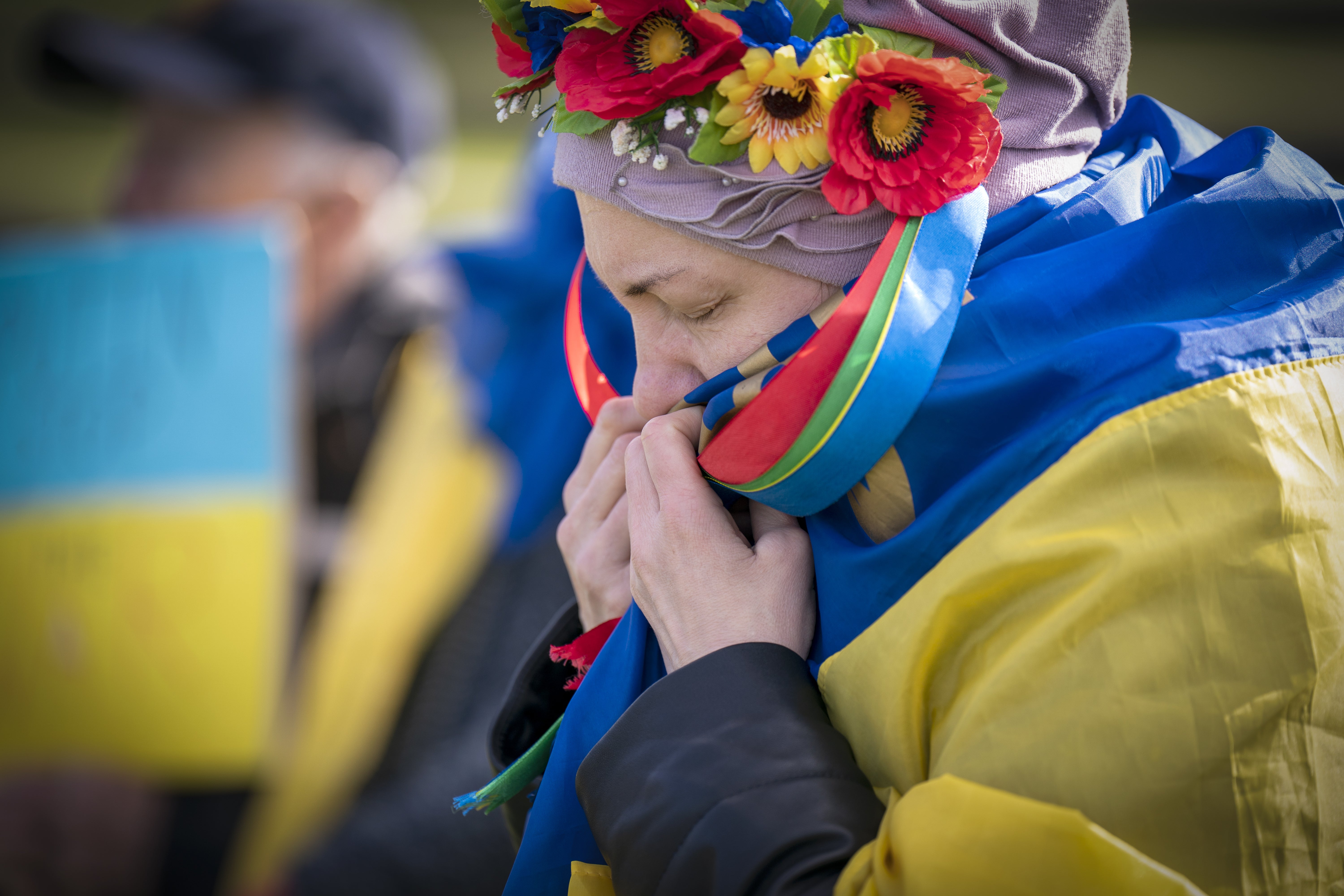 People take part in the Scotland Stands with Ukraine peace rally, outside the Scottish Parliament in Edinburgh. (Jane Barlow/PA)