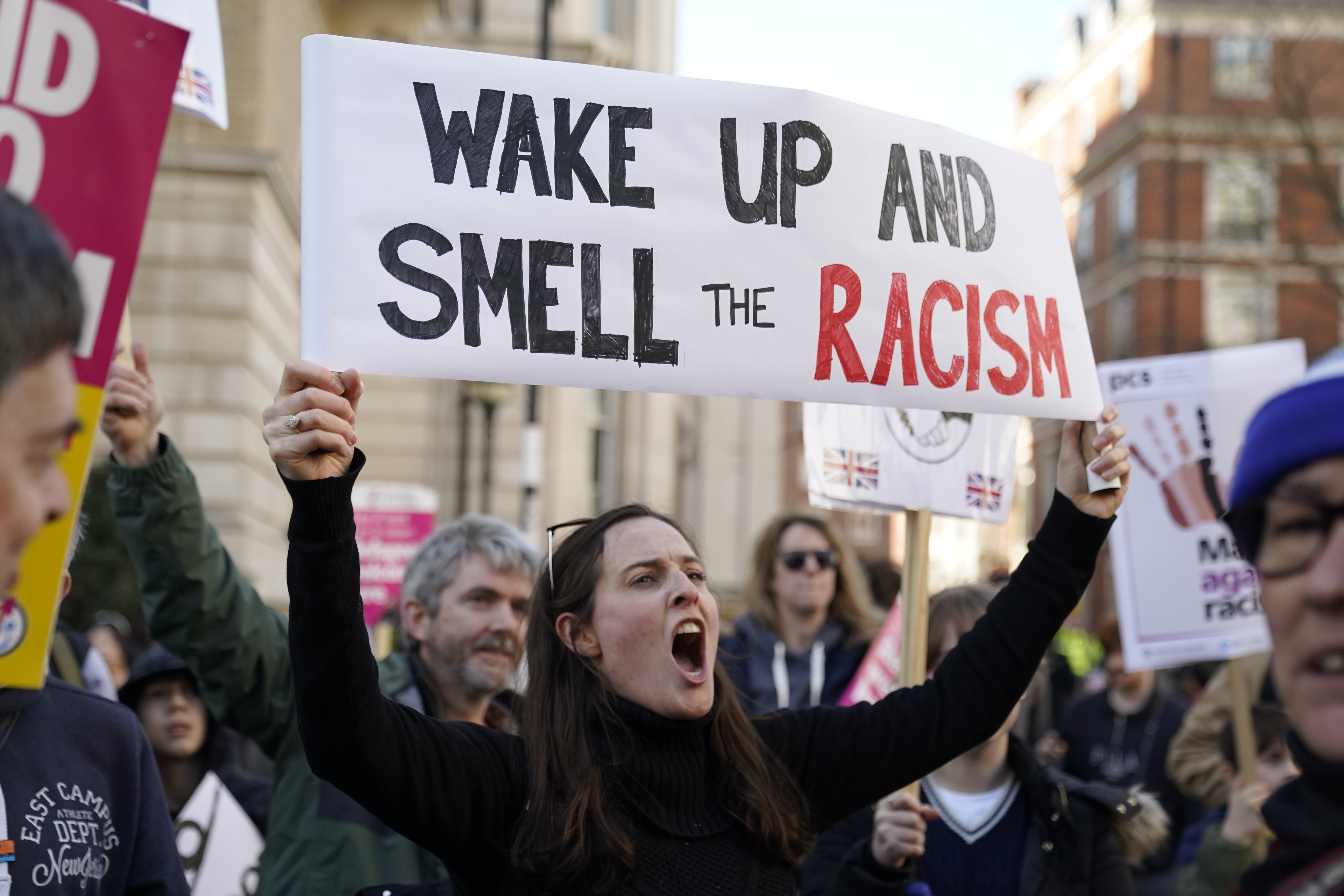 Demonstrators took to the streets to protest over the treatment of the girl on UN Anti-Racism Day (Andrew Matthews/PA)