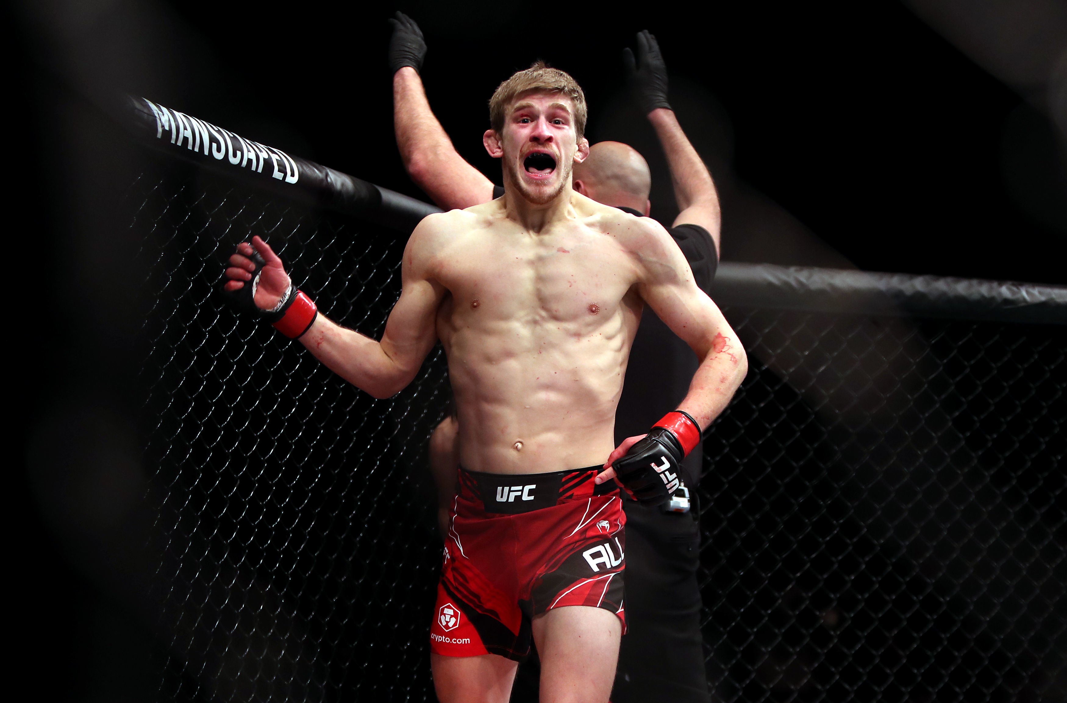 Arnold Allen celebrates the biggest victory of his career, against Dan Hooker