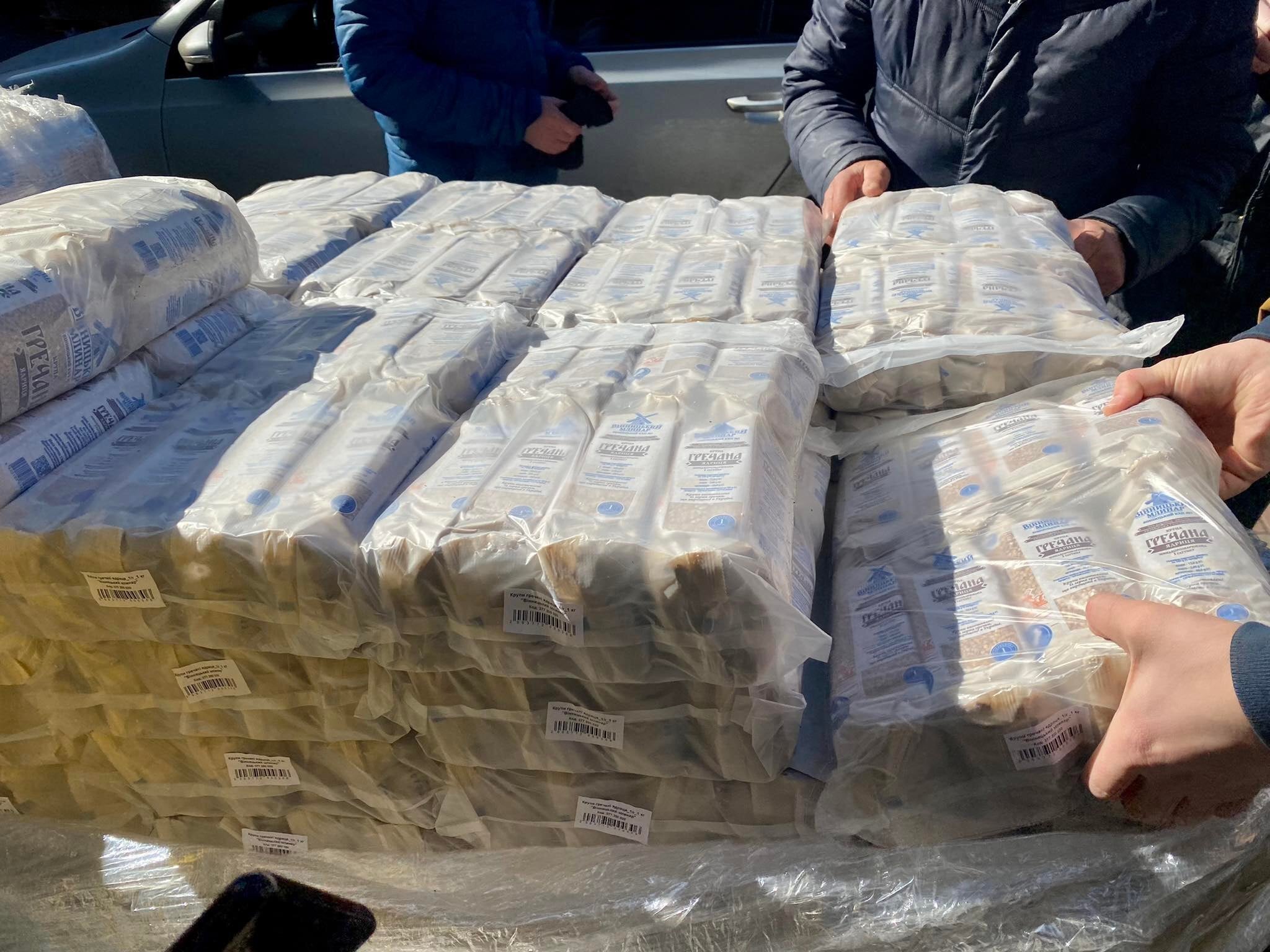 An aid worker in Ukraine prepares crucial medicine to distribute to patients in Mykolaiv