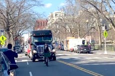 Solo cyclist thwarts the trucker ‘freedom convoy’ on the roads of Washington DC