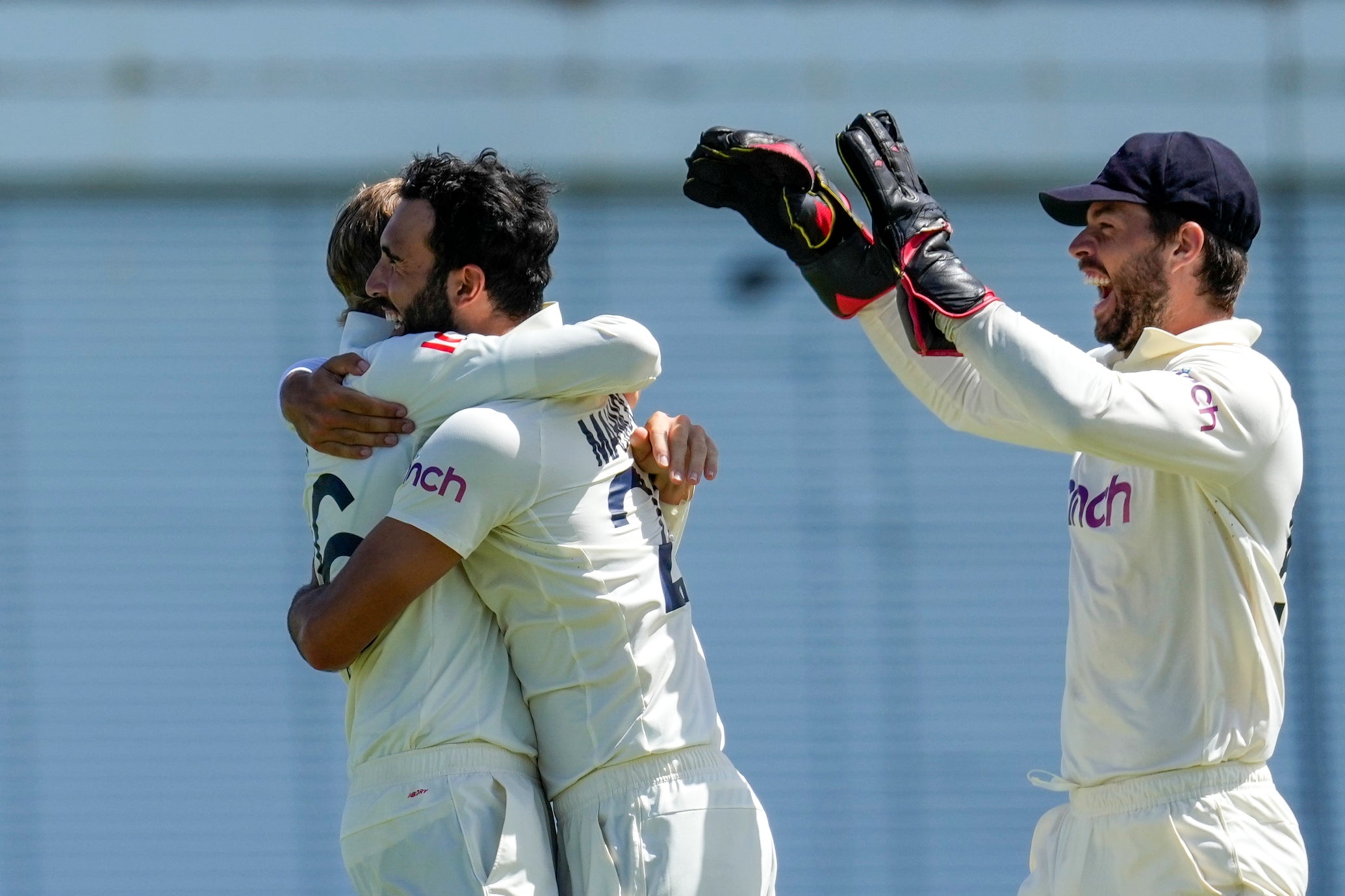 England’s Saqib Mahmood and captain Joe Root celebrate the dismissal of Shamarh Brooks (Ricardo Mazalan/AP).