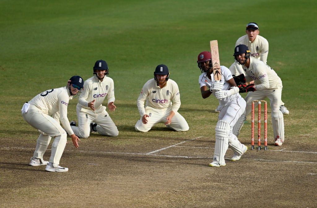 England surround West Indies captain Kraigg Brathwaite but hopes of an unlikely win soon faded