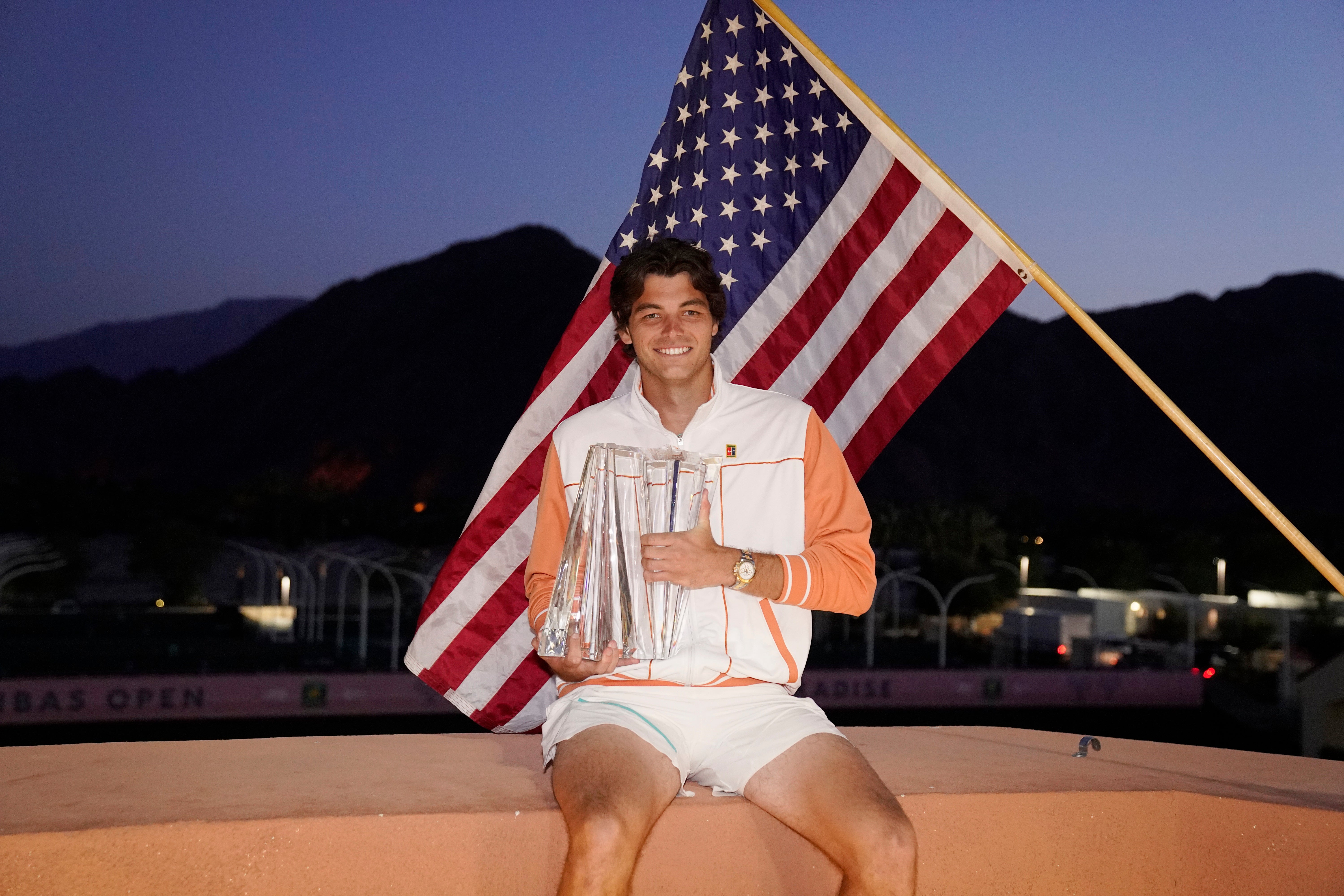 Taylor Fritz poses with the Indian Wells trophy (Mark J Terrill/AP)