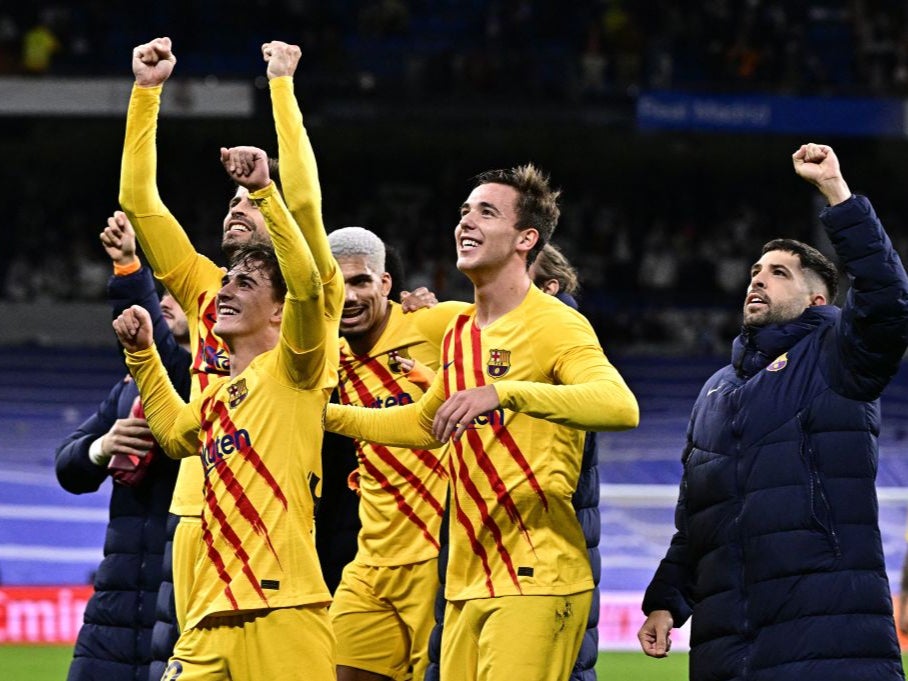 Barcelona’s players celebrate victory over Real Madrid on Sunday