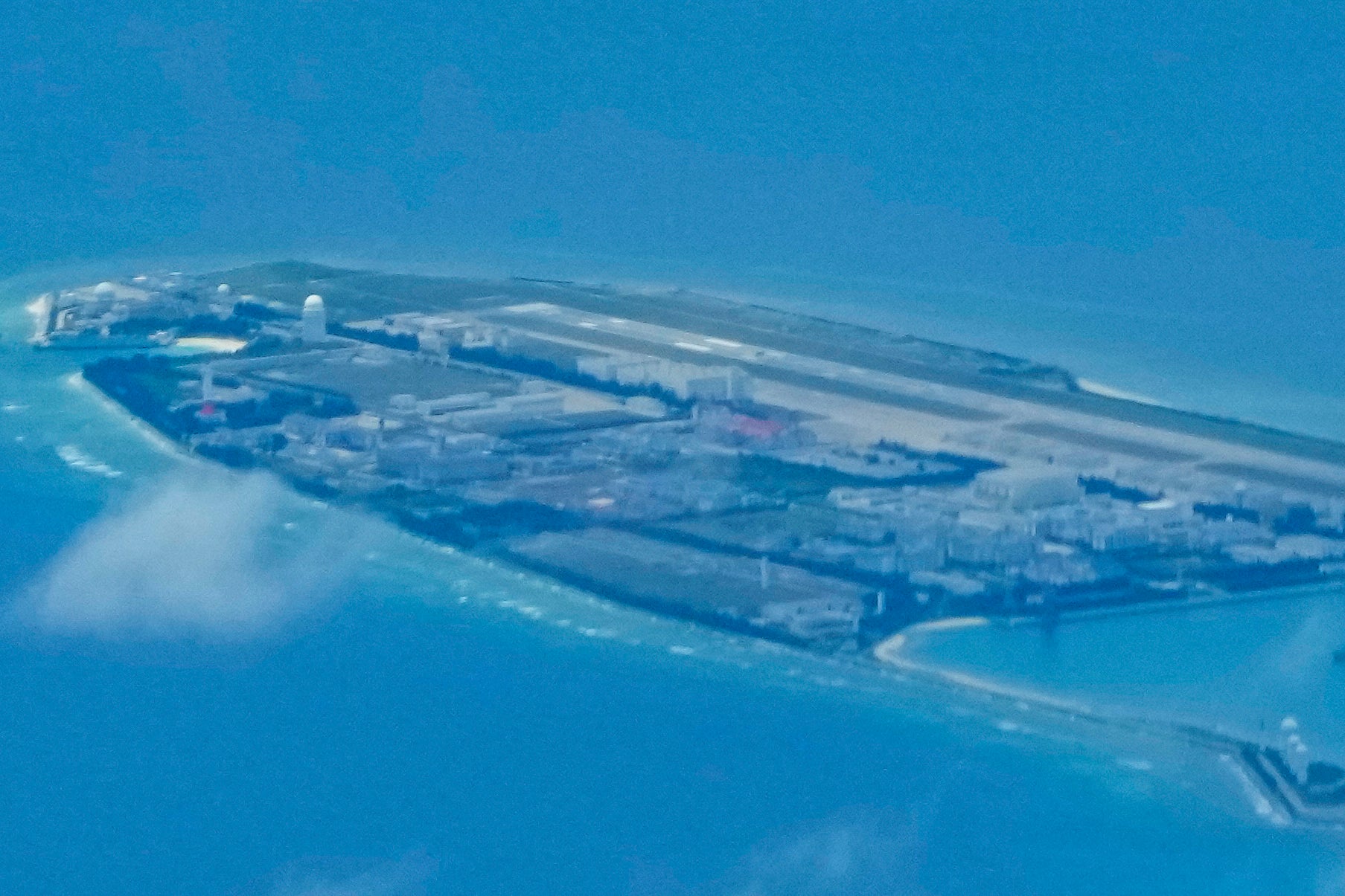 Chinese structures and buildings at the man-made island on Fiery Cross Reef at the Spratly group of islands in the South China Sea are seen on Sunday